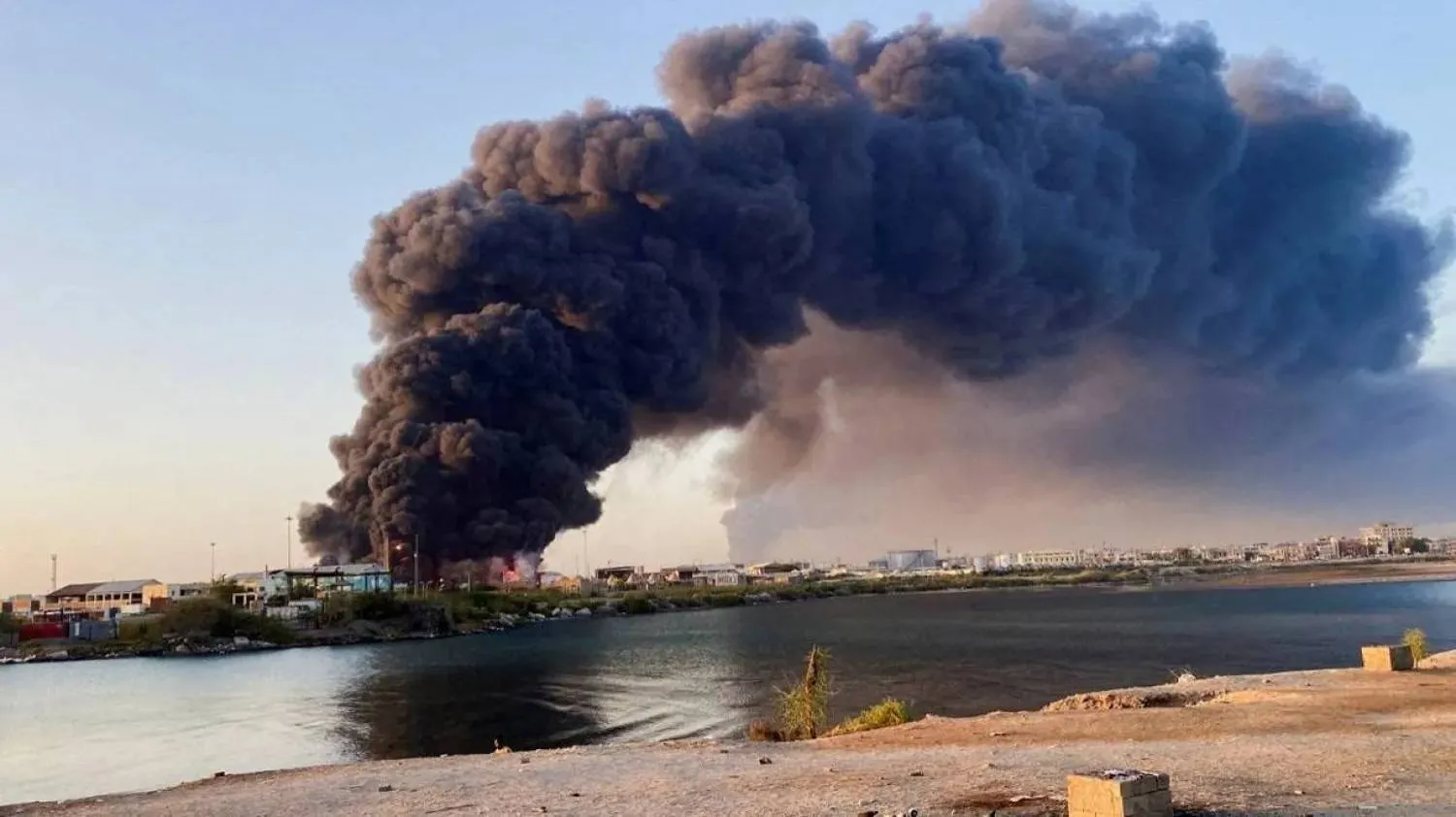 File photo: A view shows a large plume of smoke and fire rising from fuel depot in Port Sudan, Sudan, May 6, 2025. (Reuters)
