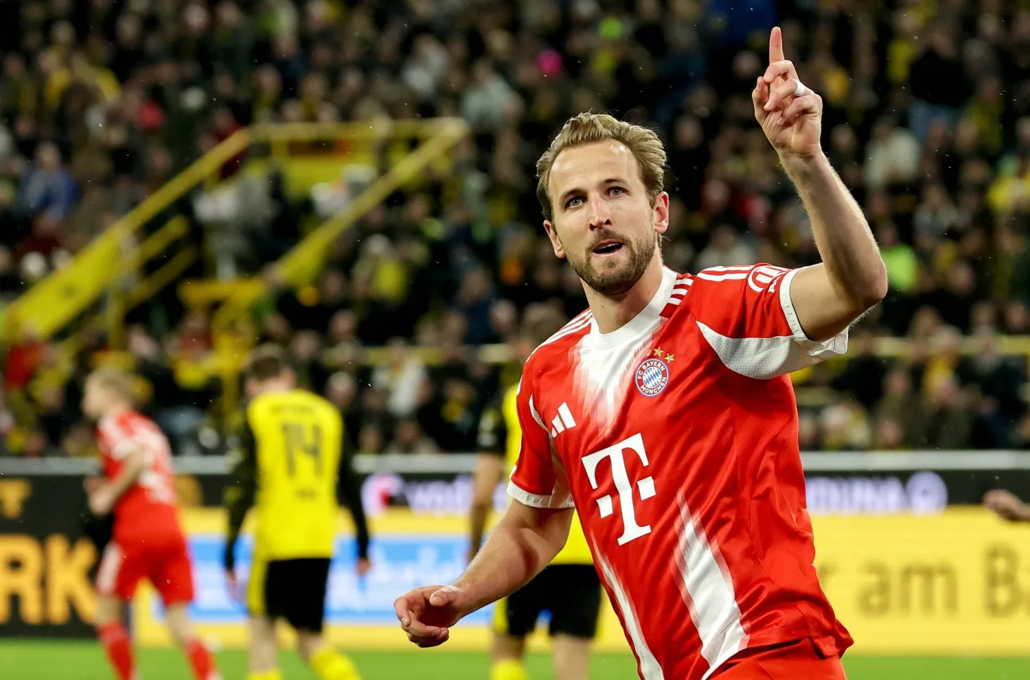 Harry Kane of Munich celebrates after scoring the 1-1 equalizer during the German Bundesliga soccer match between Borussia Dortmund and FC Bayern Munich  in Dortmund, Germany, 28 February 2026.  EPA/FRIEDEMANN VOGEL