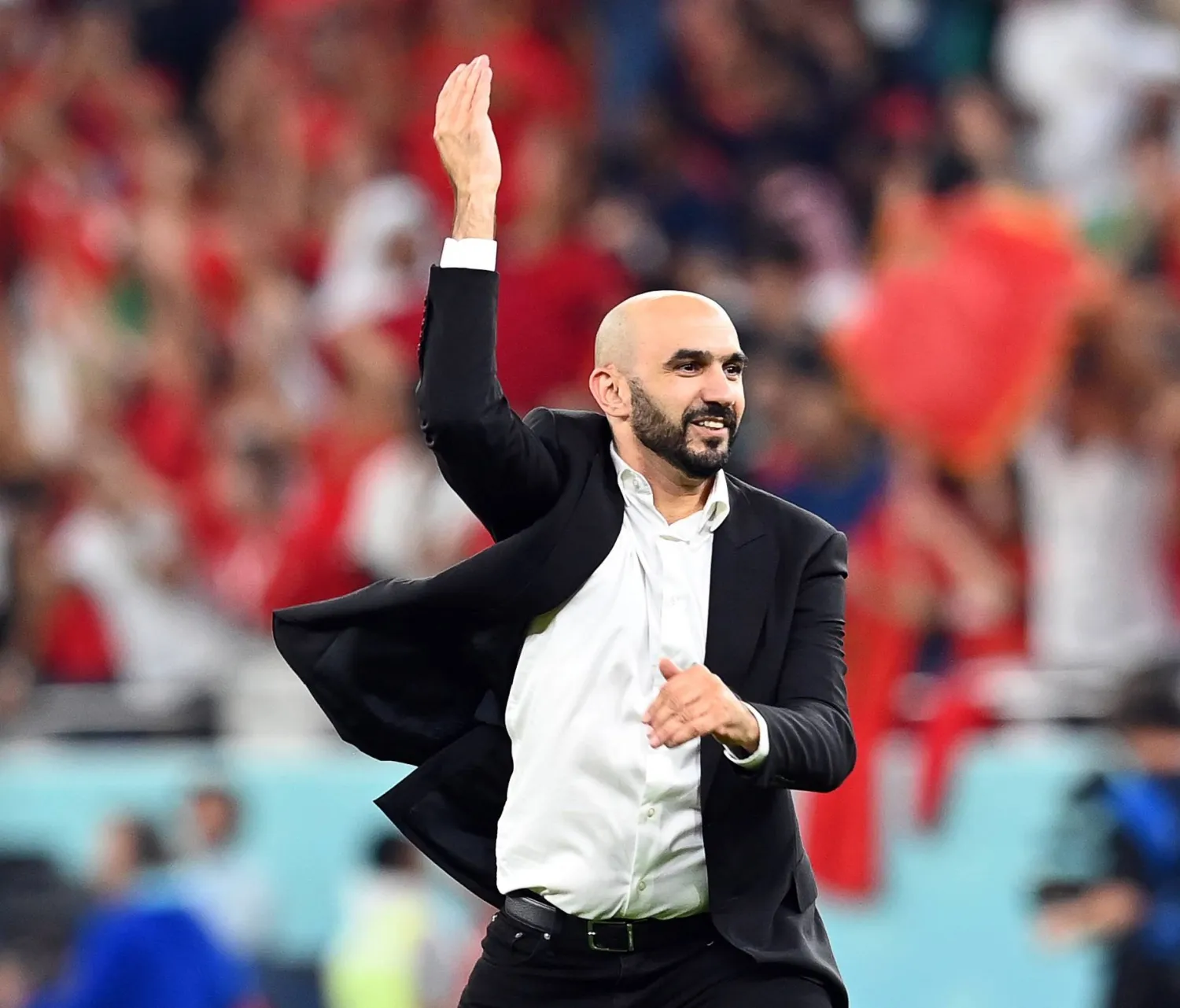 الركراكي خلال احتفالات المغرب في مونديال قطر (إ.ب.أ)