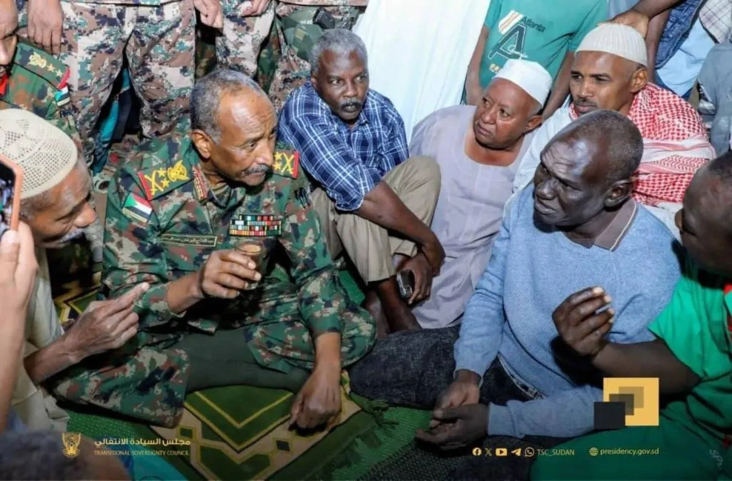 Burhan attends a Ramadan iftar with police personnel in the Haj Youssef district of Khartoum on Wednesday (Sudanese Sovereignty Council) 