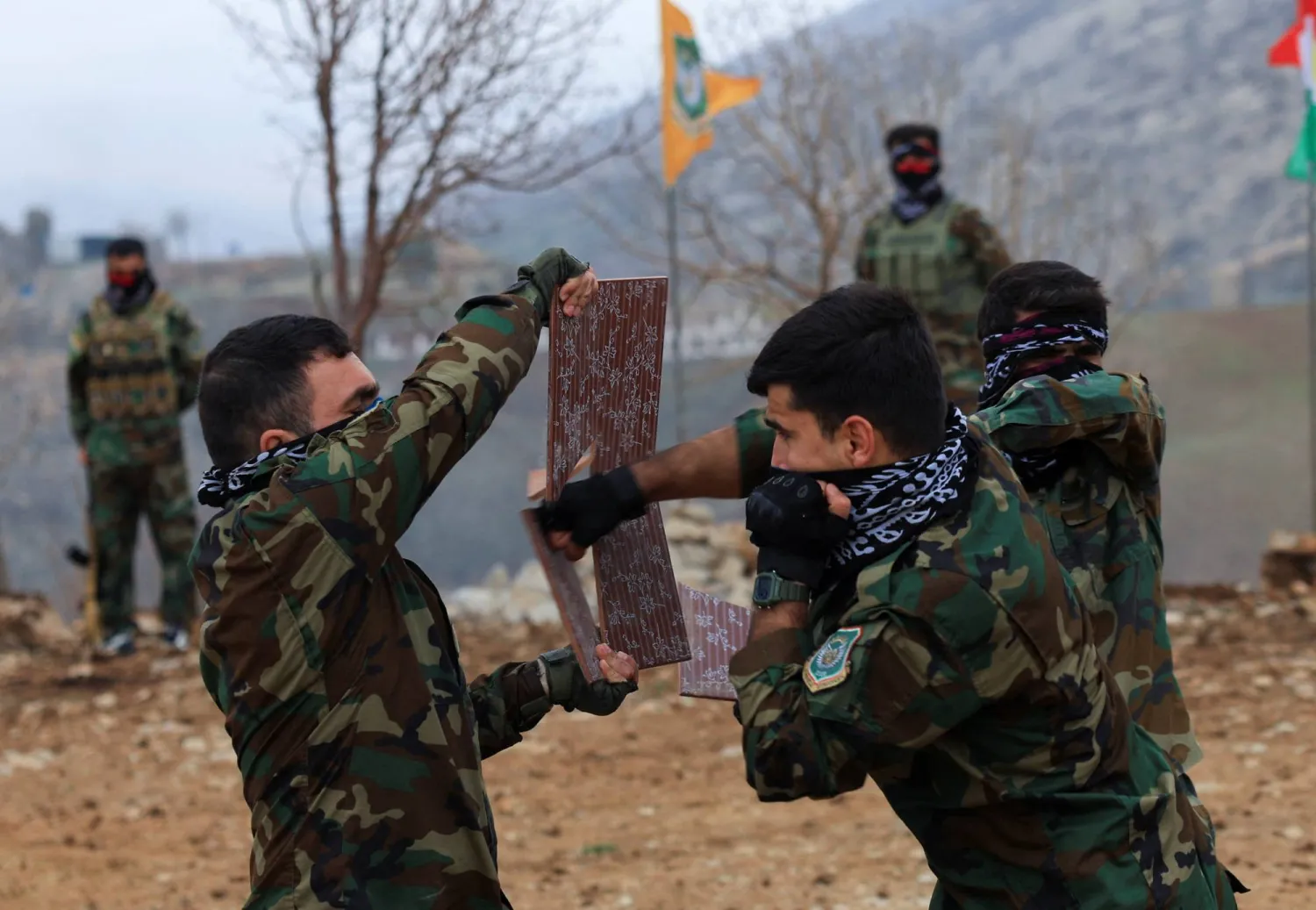 Iranian Kurdish fighters from the Kurdistan Freedom Party (PAK) take part in a training session at a base on the outskirts of Erbil, Iraq February 12, 2026. (Reuters)