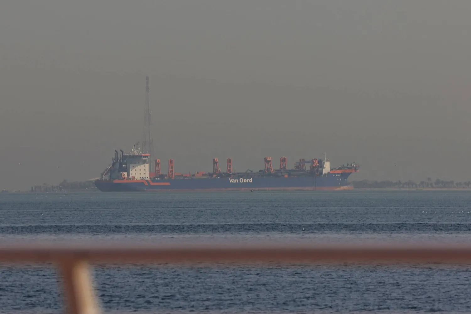 A commercial vessel is pictured offshore in Dubai on March 1, 2026. (AFP)