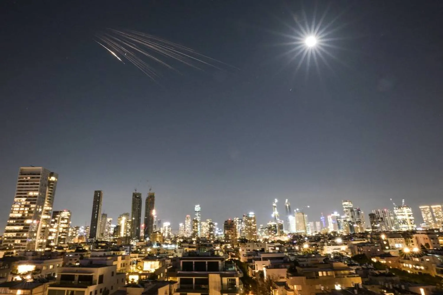 An Iranian missile with cluster munitions flies towards Israel, amid the US-Israeli conflict with Iran, in central Israel, March 5, 2026. (Reuters)