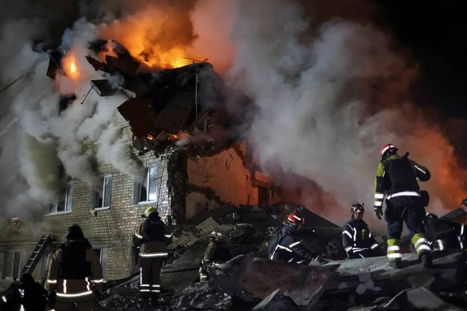 Rescuers work at the site of the apartment building hit by a Russian missile strike, amid Russia's attack on Ukraine, in Kharkiv, Ukraine March 7, 2026. (Reuters)
