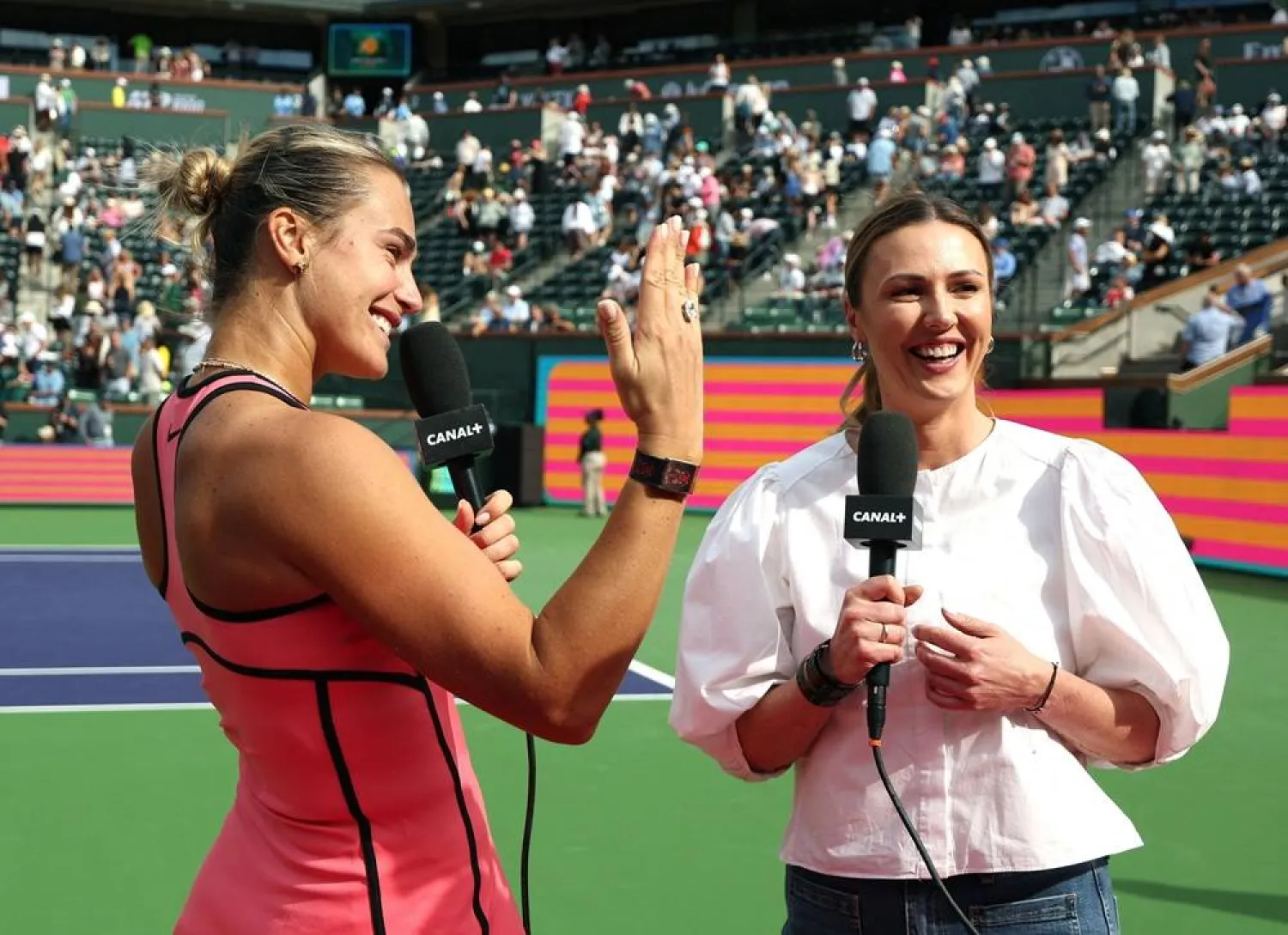 Aryna Sabalenka of Belarus shows off her engagement ring during an interview with Joanna Sakowicz Kostecka after a match against Himeno Sakatsume of Japan during Day 3 of the BNP Paribas Open at Indian Wells Tennis Garden on March 06, 2026 in Indian Wells, California. (Getty Images/AFP)