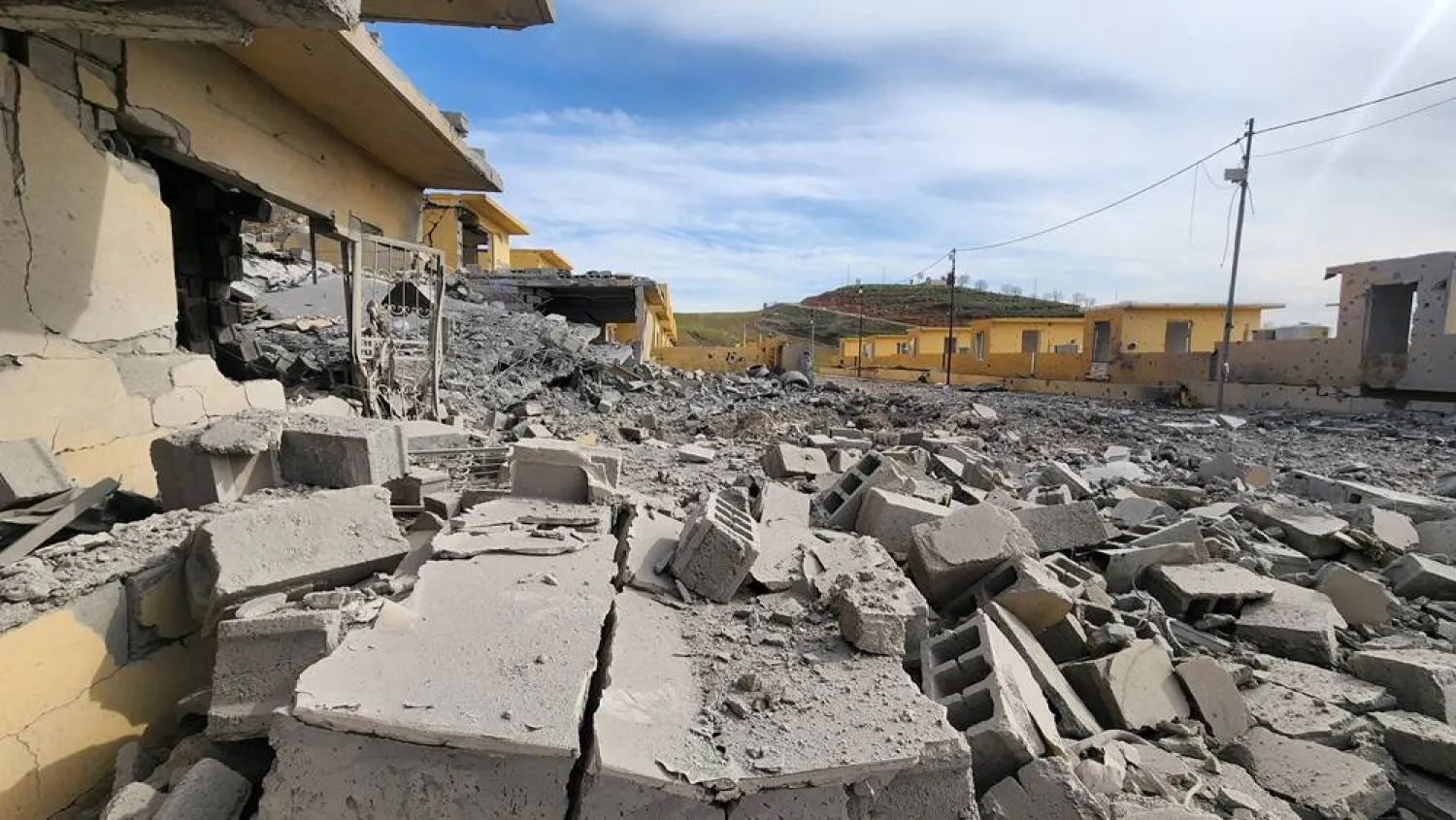 Rubble of destroyed buildings lies following, what the security sources say, a drone struck an arms depot in an attack on the headquarters of an Iranian Kurdish opposition group in which two fighters were wounded, amid the US-Israeli conflict with Iran, in the town of Dekala in Iraq's Kurdistan region March 4, 2026. (Reuters)