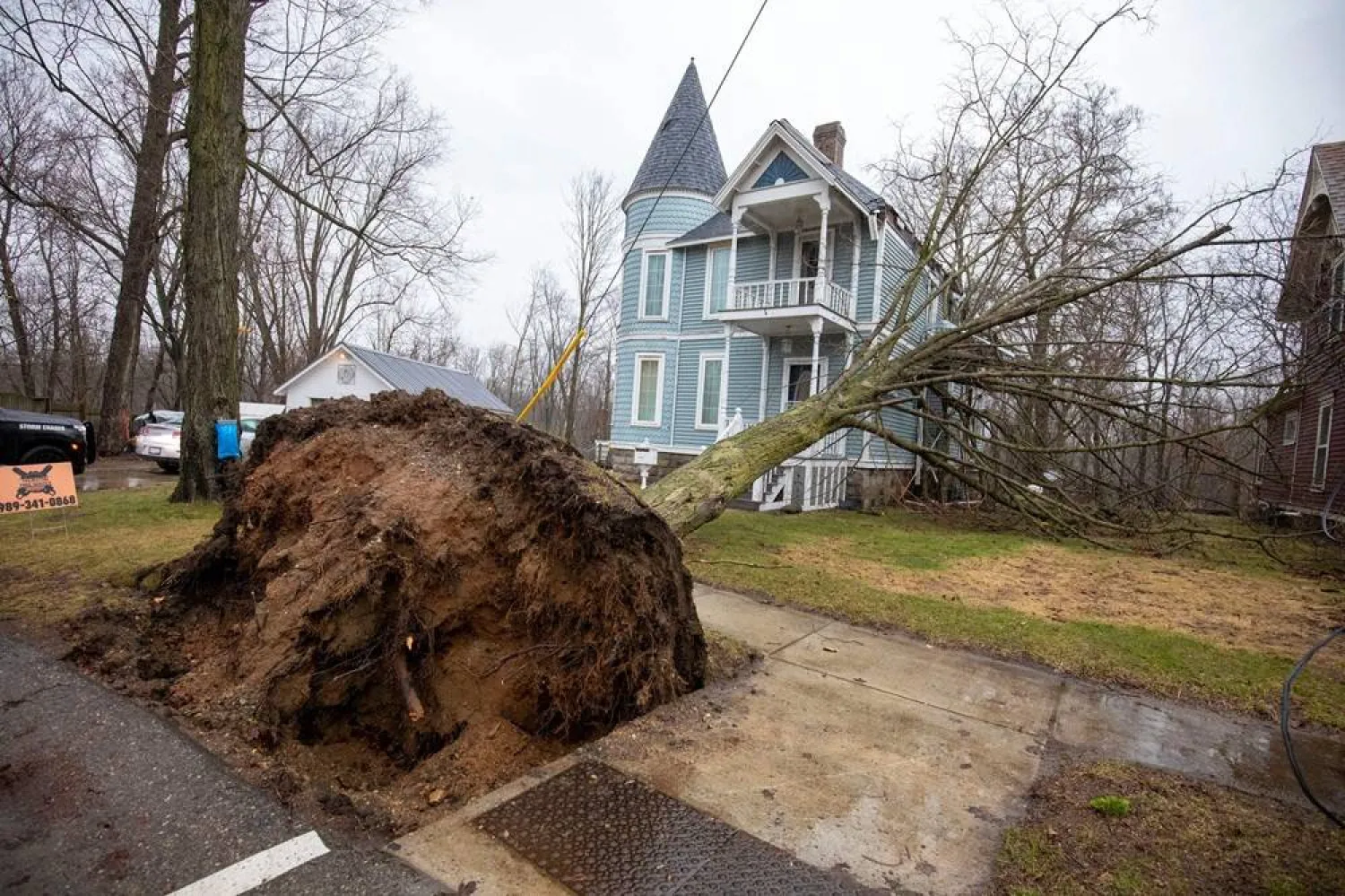 A tree is left uprooted following a tornado that hit several cities in rural southwest Michigan on March 7, 2026 in Union City, Michigan. (Getty Images/AFP)