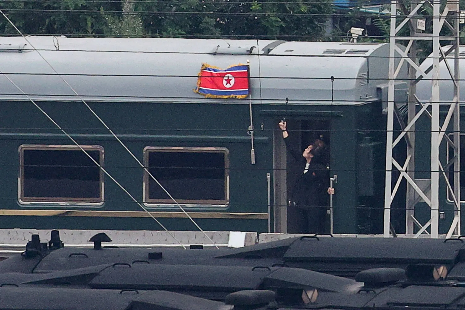 A North Korean flag flutters from a train believed to be carrying North Korean leader Kim Jong Un, as it arrives in Beijing, China, September 2, 2025. (Reuters)