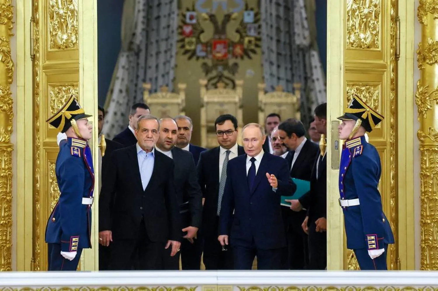 Iranian President Masoud Pezeshkian, center left, and Russian President Vladimir Putin, center right, arrive at a ceremony following their talks at the Kremlin in Moscow, Russia, on Jan. 17, 2025. (Vyacheslav Prokofyev, Sputnik, Kremlin Pool Photo via AP, File) 