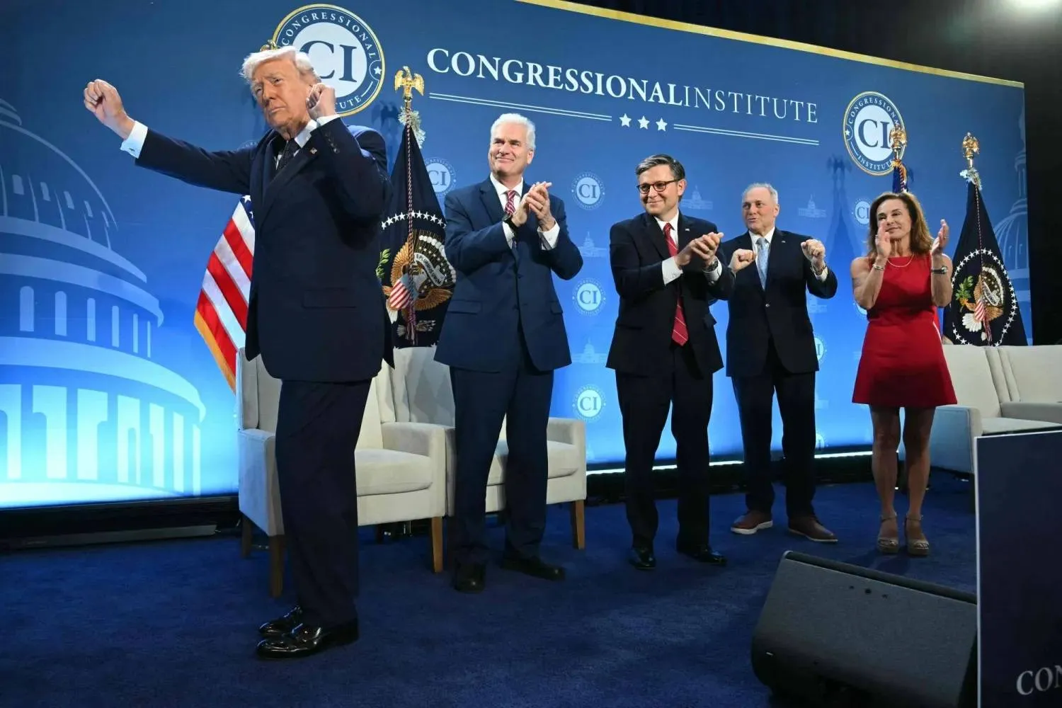 US President Donald Trump dances during a private celebration with the Republican majority in the House of Representatives in Florida on Monday (AFP)