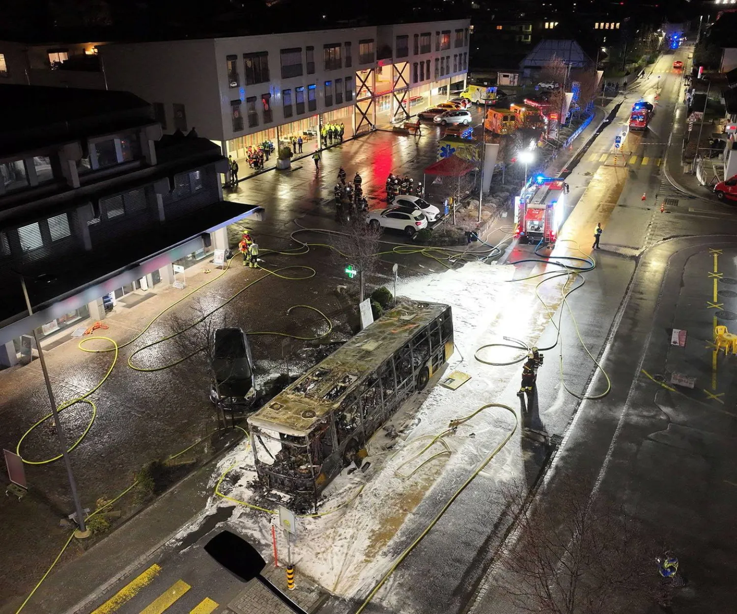 Emergency personnel work at the site of a deadly bus fire in Kerzers, Switzerland, March 10, 2026. STATE OF FREIBURG/Handout via REUTERS