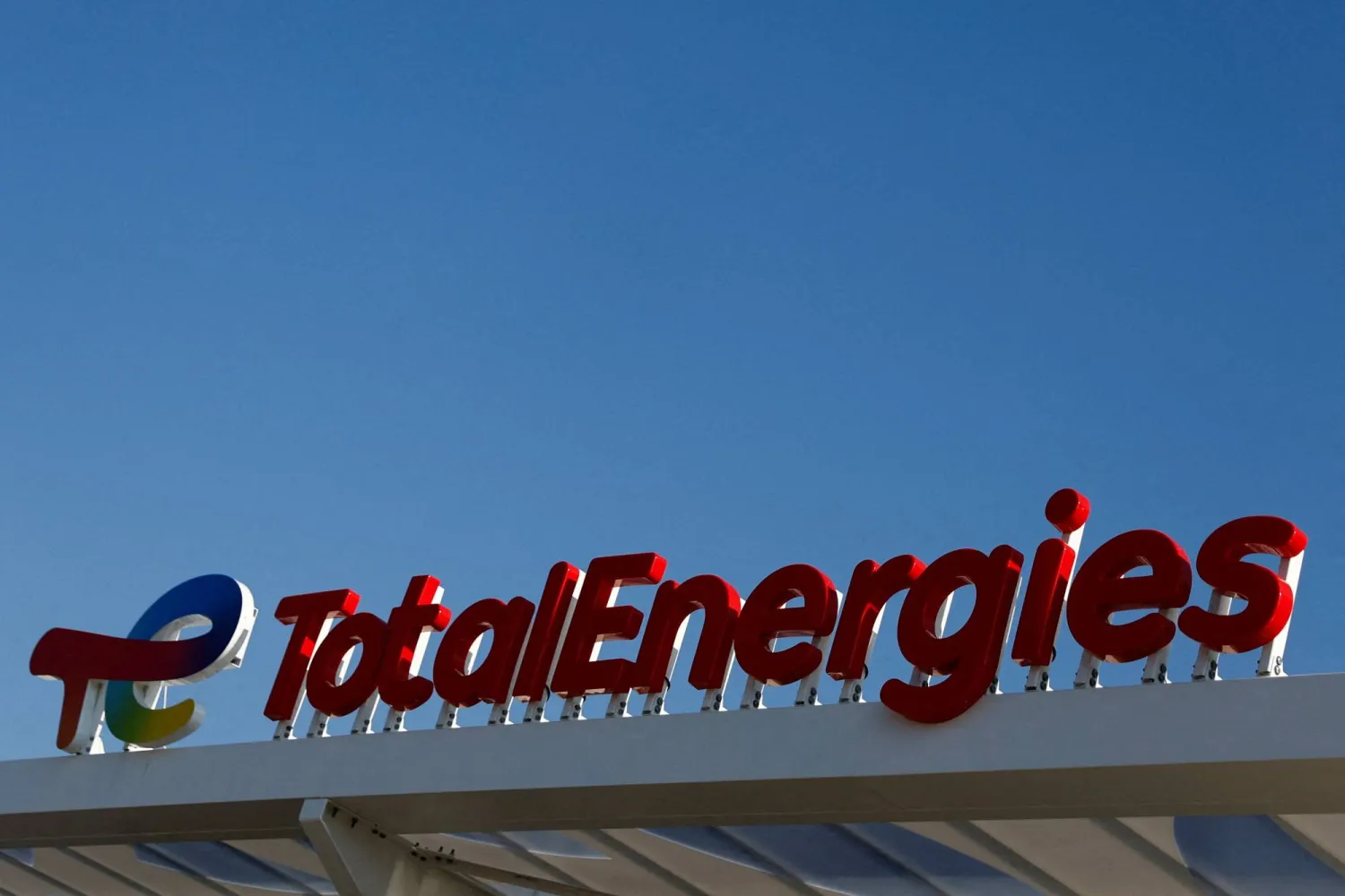 FILE PHOTO: The logo of French oil and gas company TotalEnergies is seen on a gas station in Drancy, France March 17, 2025. REUTERS/Abdul Saboor/File Photo