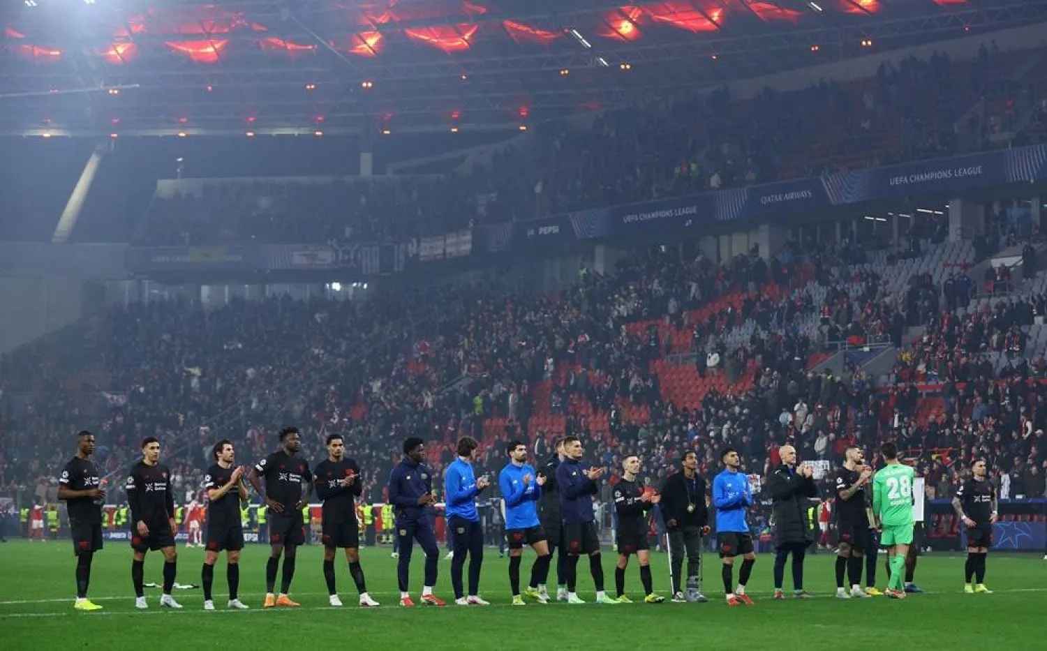  Soccer Football - UEFA Champions League - Round 16 - First Leg - Bayer Leverkusen v Arsenal - BayArena, Leverkusen, Germany - March 11, 2026 Bayer Leverkusen players applaud their fans after the match. (Reuters)