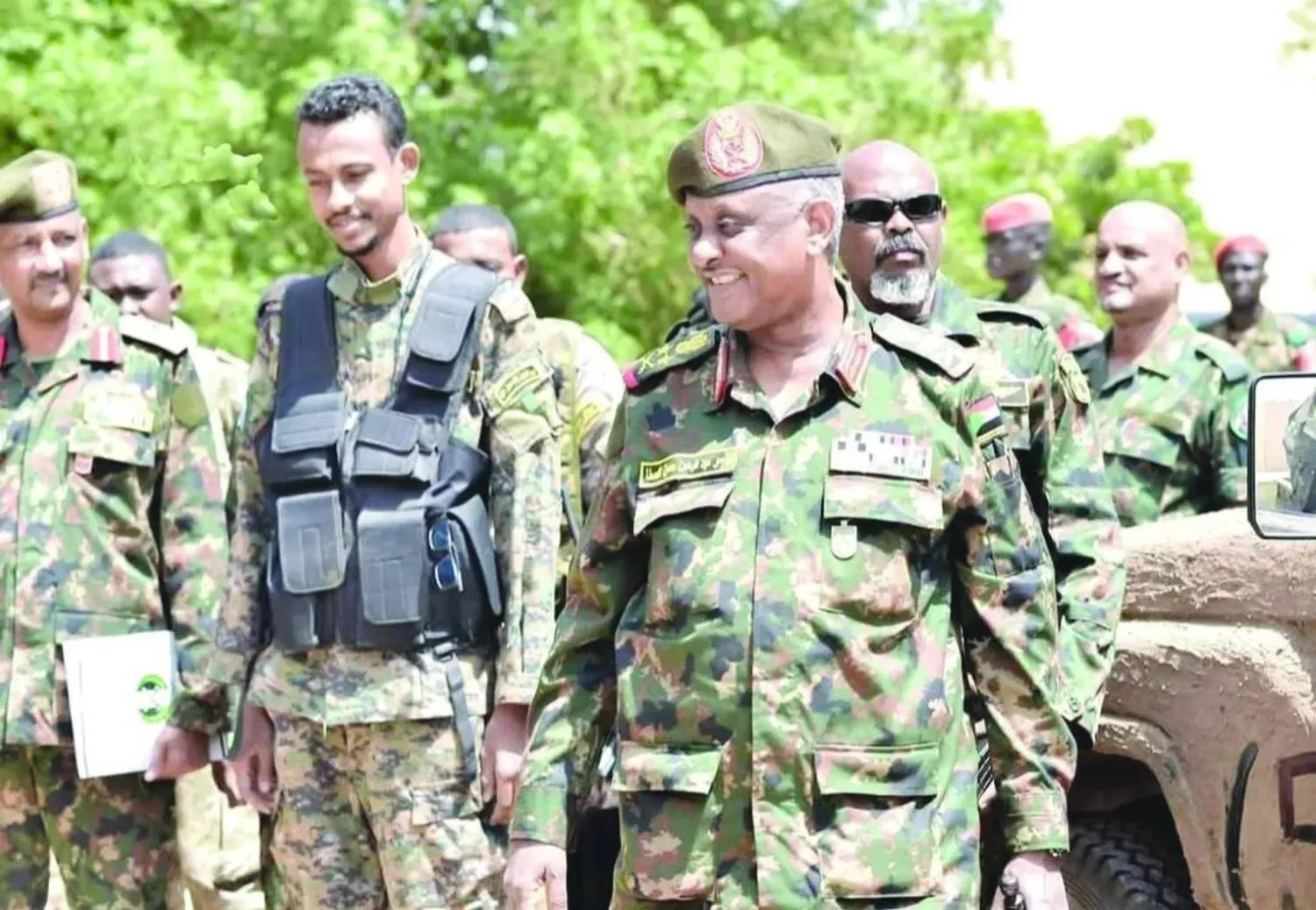 A circulating image shows Yasser al-Atta with the commander of the Islamist al-Baraa bin Malik militia fighting alongside the army