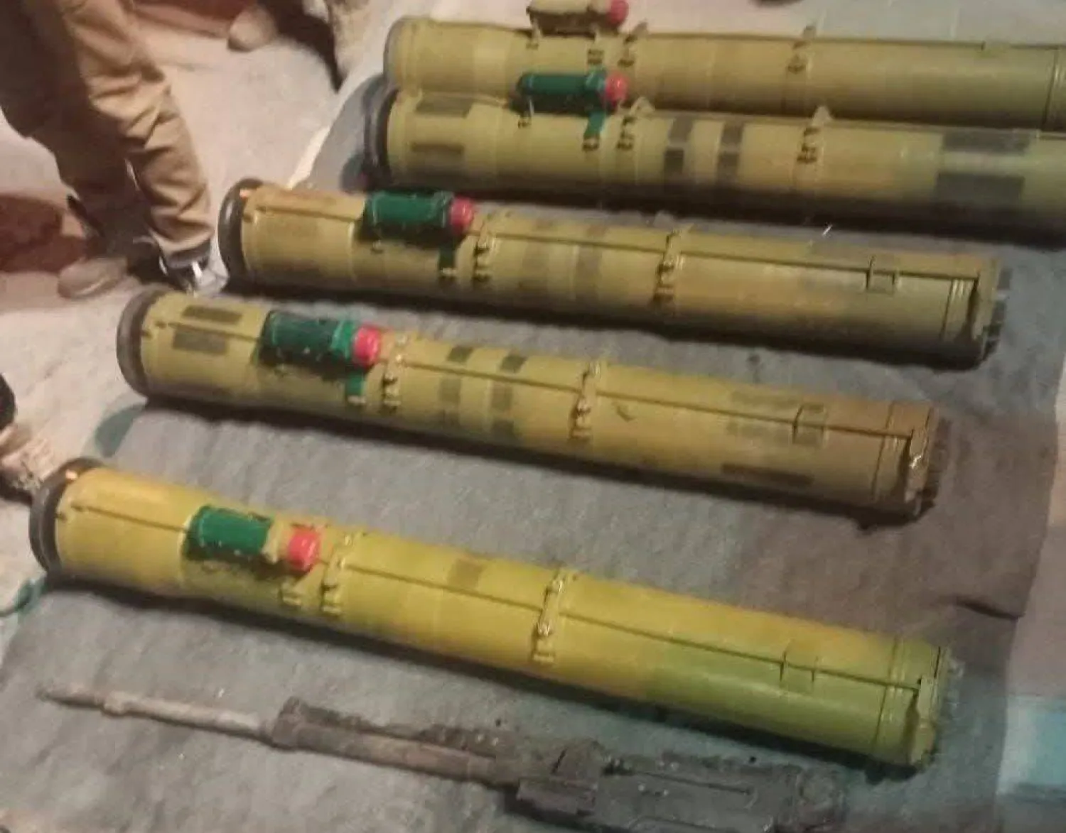 A photo released by Syrian authorities shows weapons they said were intended to be smuggled across the border into Lebanon. (Rif Dimashq Media Directorate)