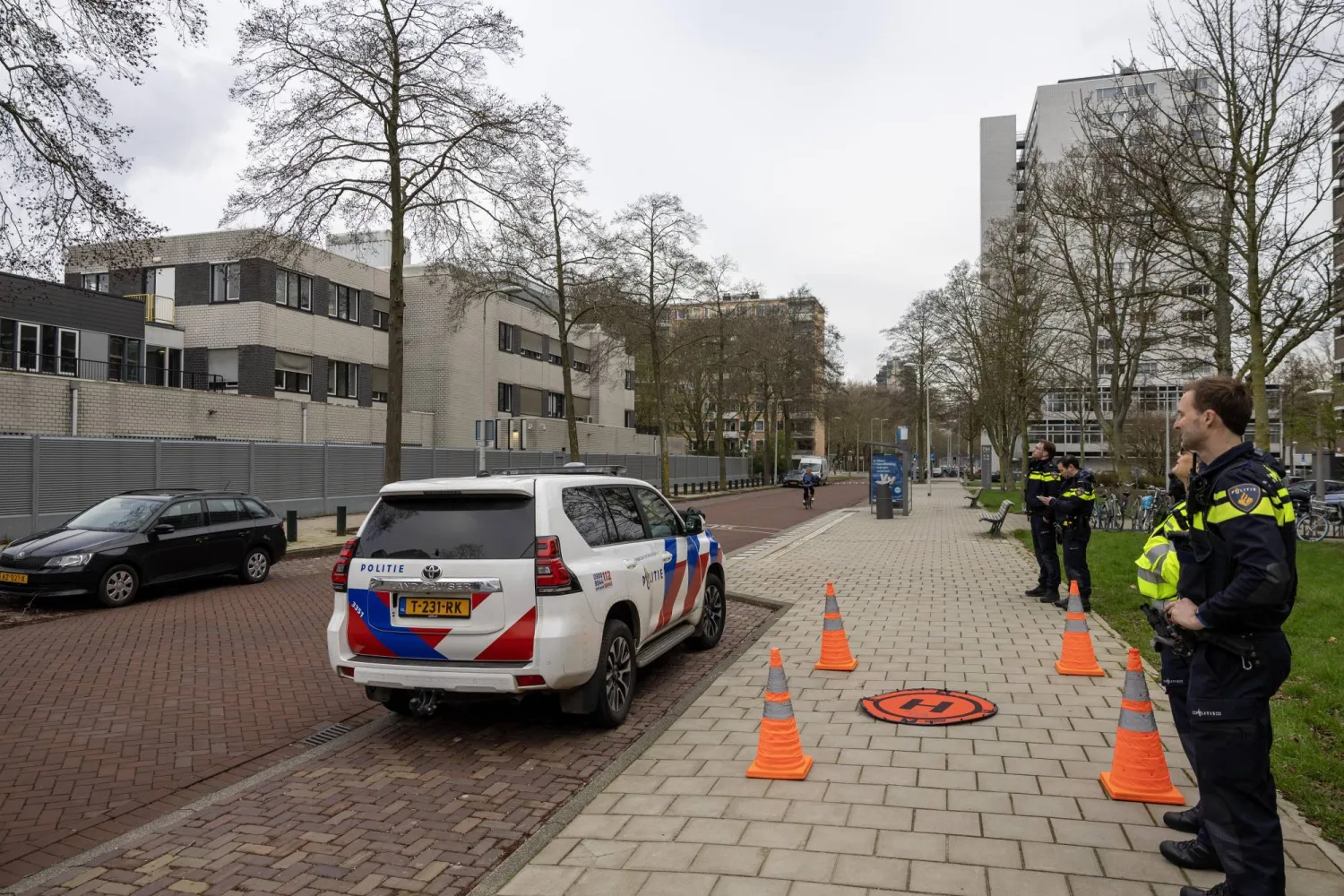 Policemen stand at the scene following an overnight explosion at a Jewish school on Zeelandstraat in the Buitenveldert district of Amsterdam, the Netherlands, 14 March 2026. EPA/MICHEL VAN BERGEN
