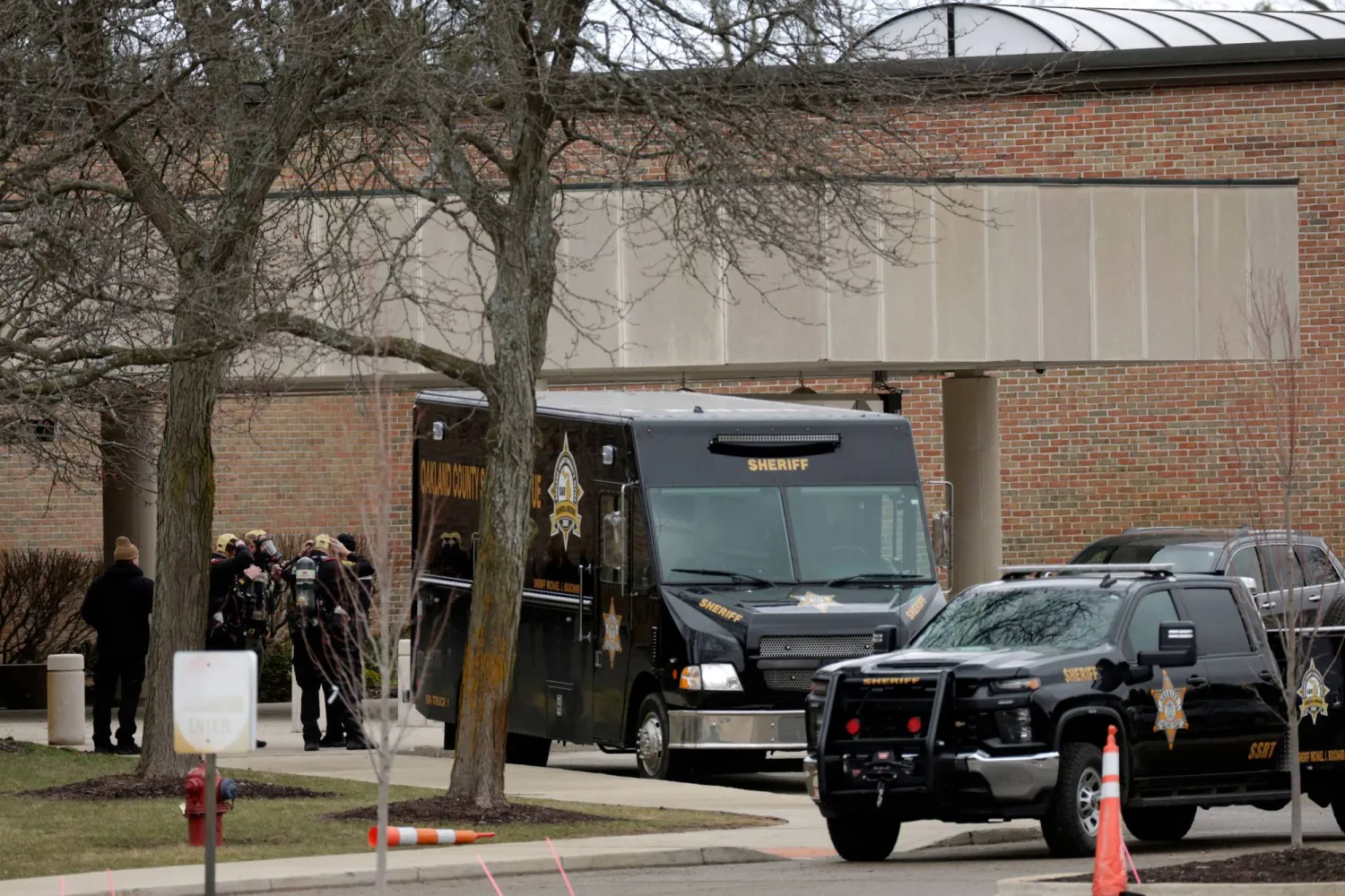 Oakland County Sheriff Deputies prepare to enter Temple Israel synagogue in West Bloomfield, Michigan, on March 13, 2026, after a person drove a vehicle into the synagogue a day earlier. (AFP)