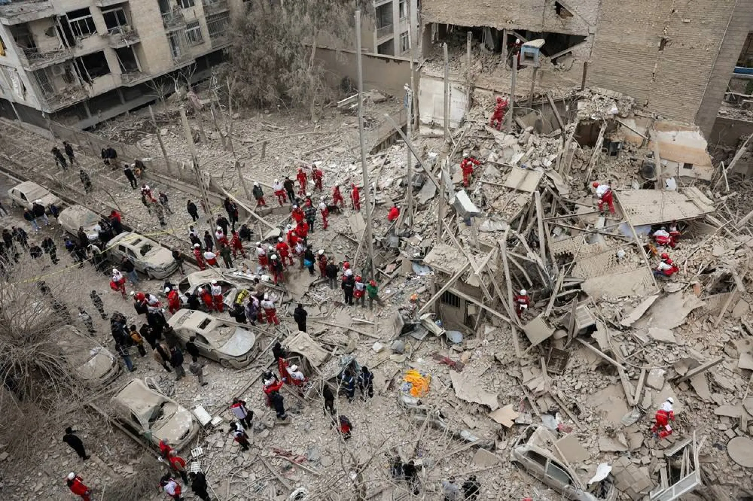 Emergency personnel work at the site of a strike on a residential building, amid the US-Israeli conflict with Iran, in Tehran, Iran, March 16, 2026. Majid Asgaripour/WANA (West Asia News Agency) via Reuters