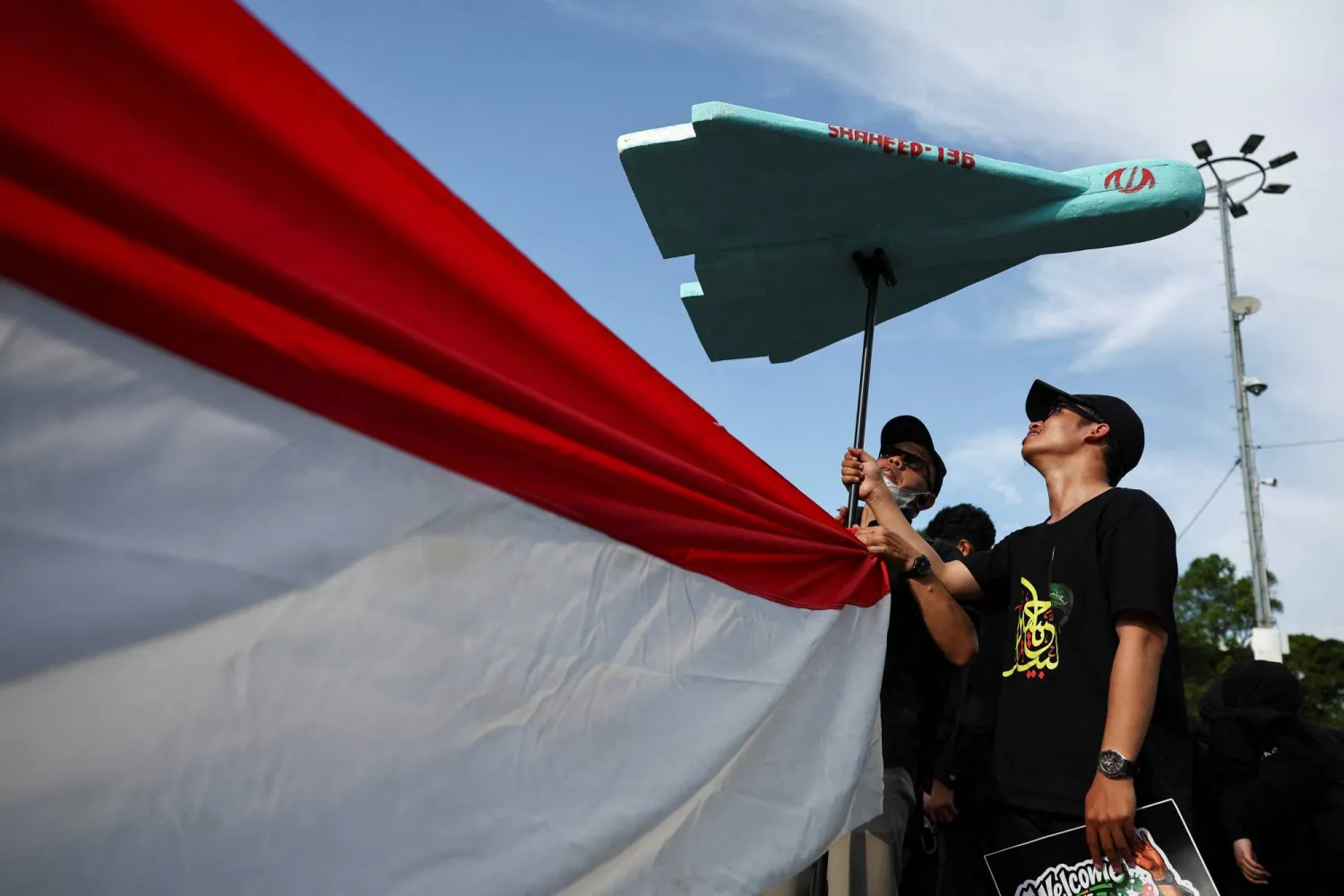 Protesters hold a mockup of Iranian-made drone Shahed-136, during a rally marking al-Quds Day (Jerusalem Day), amid the US-Israeli conflict with Iran, outside the U.S. Embassy in Jakarta, Indonesia, March 13, 2026. (EPA)