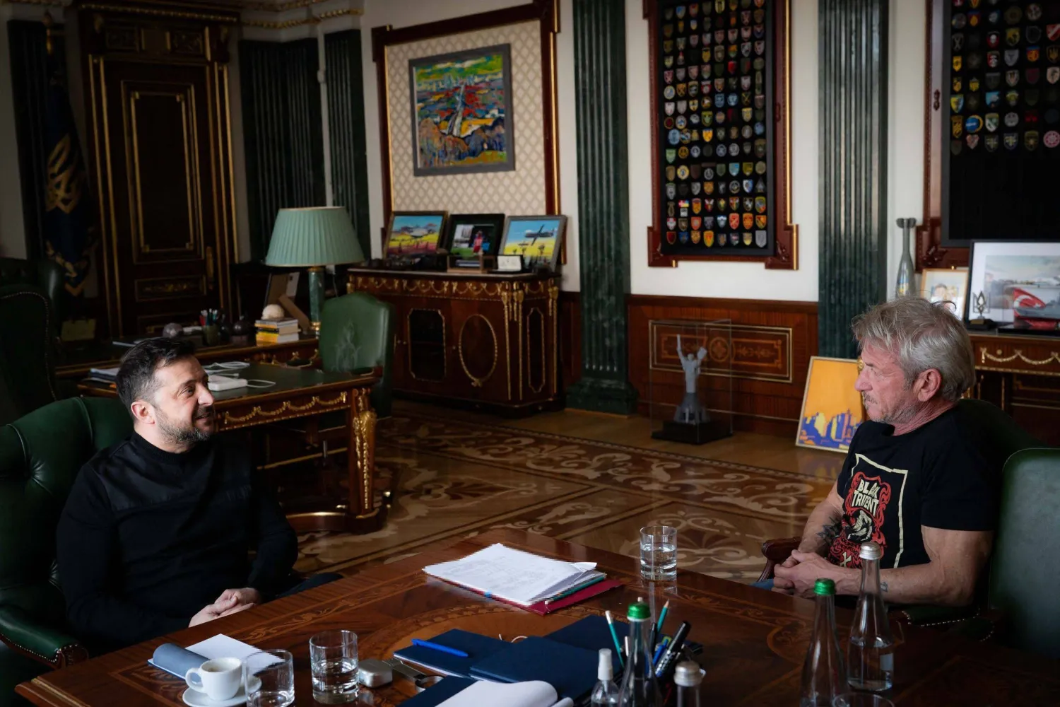 In this handout photograph taken and released by the Ukrainian Presidential Press Service on March 16, 2026, Ukraine's President Volodymyr Zelensky (L) meets with US actor Sean Penn (R) at his office in Kyiv, amid the Russian invasion of Ukraine. (Handout / Ukrainian Presidential Press Service / AFP)