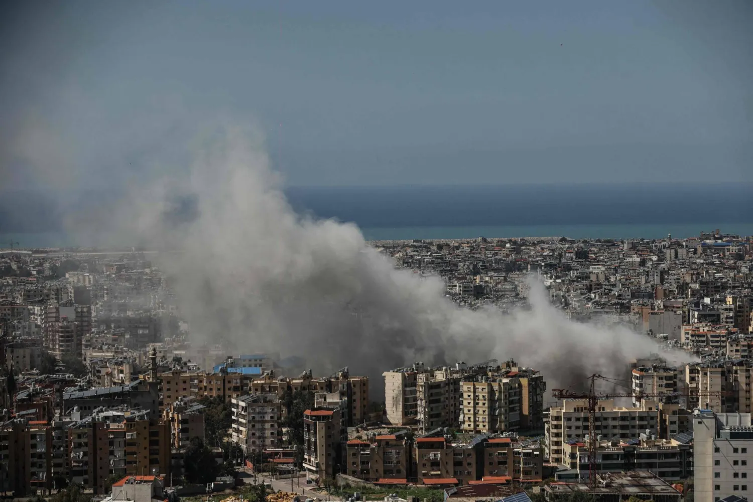 Smoke rises from the site of an Israeli airstrike that targeted an area in Beirut's southern suburbs on March 17, 2026. (AFP)