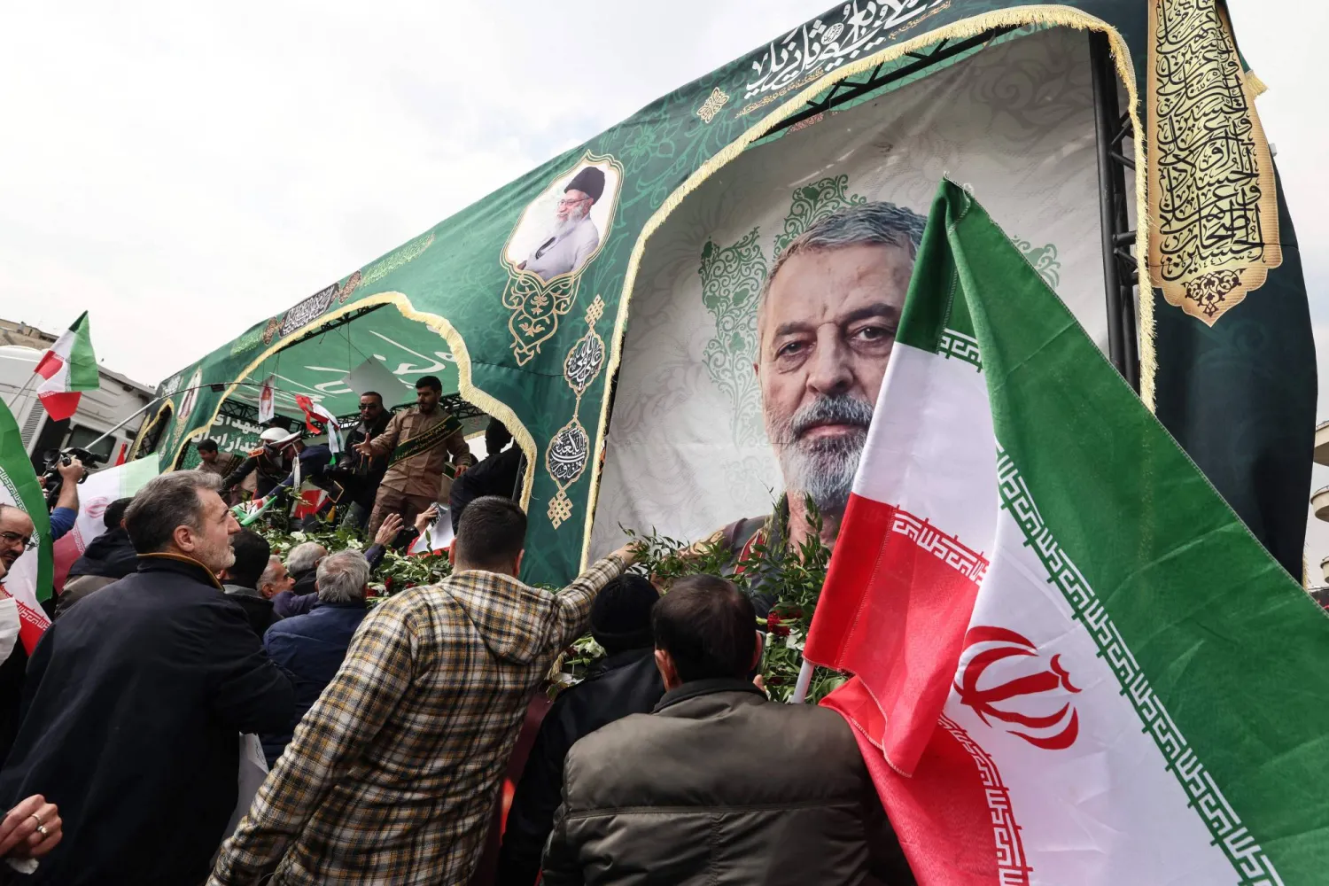 Iranians attend the funeral of Iran's Revolutionary Guards Corps (IRGC) commanders, army commanders and others killed in the early days of the United States and Israeli strikes on Iran, at Enghelab Square in Tehran on March 11, 2026. (AFP)