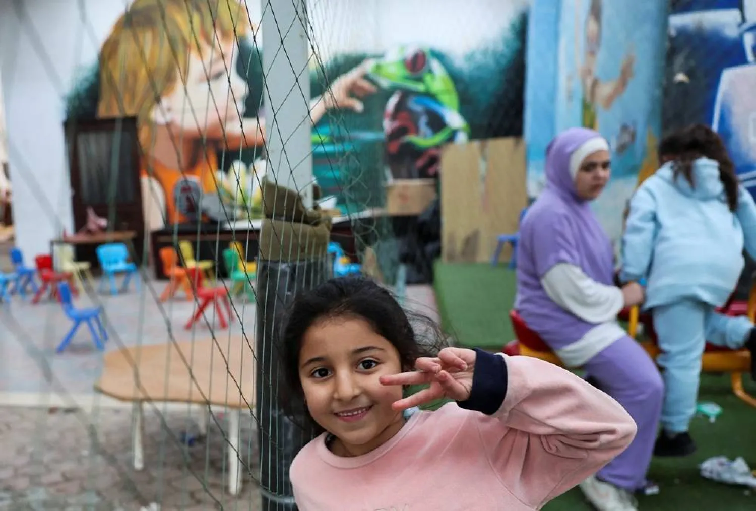  A displaced girl from Majdal Zoun in southern Lebanon looks on inside Al-Jaafareya High School, being used as a shelter for displaced families, following an escalation between Hezbollah and Israel, amid the US-Israeli conflict with Iran, after they arrive in Tyre, Lebanon, March 17, 2026. (Reuters)