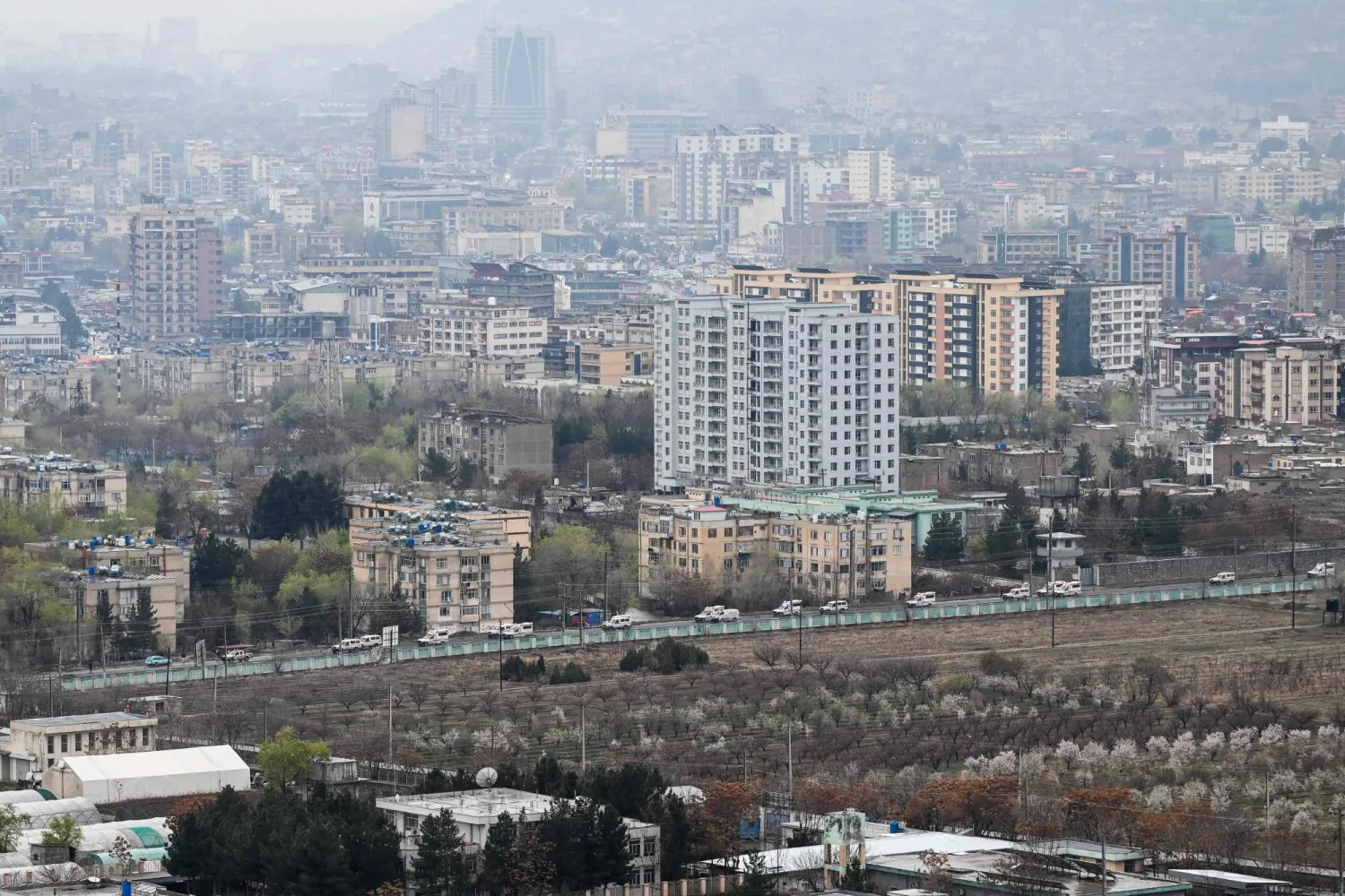 Ambulances carrying the bodies of victims killed in a Pakistani airstrike on a drug rehabilitation center, make their way to the Badam Bagh Hilltop for a funeral and mass burial in Kabul on March 18, 2026. (AFP)