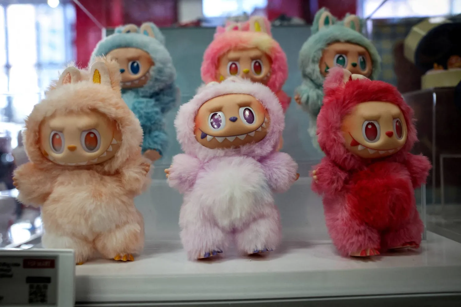 FILE PHOTO: Toys are displayed at at Pop Mart's Skullpanda pop-up shop in Manhattan, in New York City, US, December 12, 2025. REUTERS/Mike Segar/File Photo