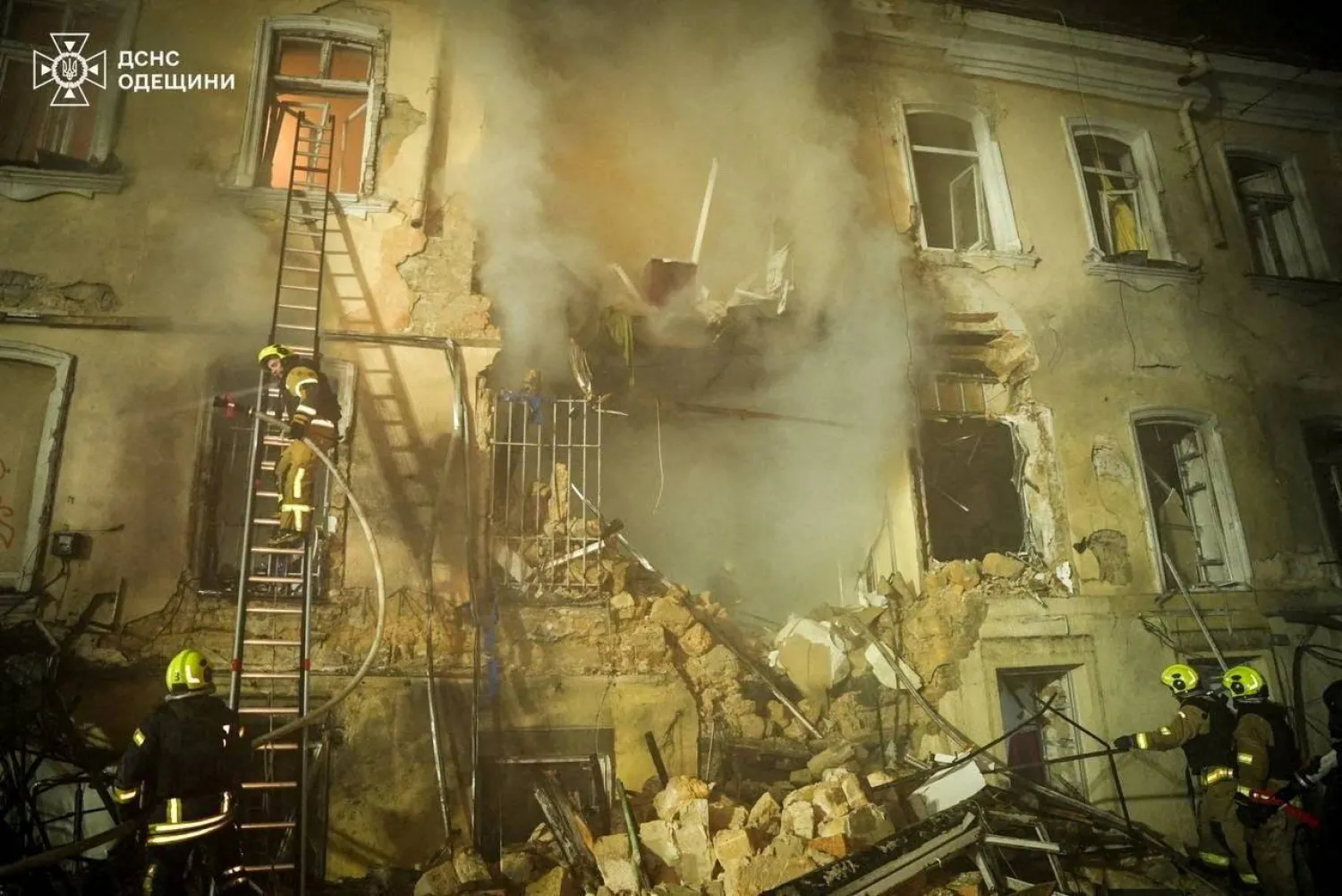 Rescuers work at the site of an apartment building hit by a Russian drone strike, amid Russia's attack on Ukraine, in Odesa, Ukraine in this handout picture released March 19, 2026. (Press service of the State Emergency Service of Ukraine in Odesa region/Handout via Reuters)