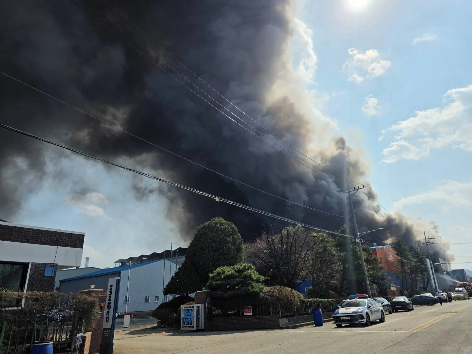 Smoke rises from at a car parts factory in Daejeon, South Korea, March 20, 2026. Yonhap via REUTERS
