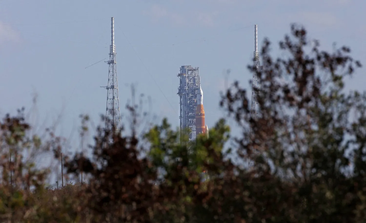 NASA's Artemis II Space Launch System (SLS) rocket and Orion spacecraft are seen at Launch Pad 39B at the Kennedy Space Center in Cape Canaveral, Florida on March 20, 2026. (Photo by Gregg Newton / AFP)