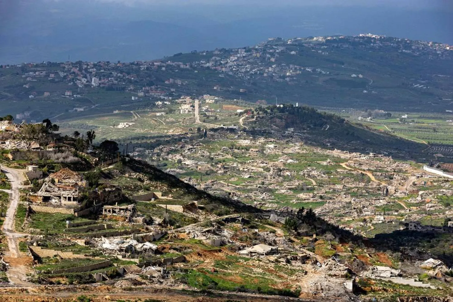 Destroyed houses and buildings in southern Lebanon are seen across the border from the Upper Galilee in northern Israel on March 20, 2026. (AFP)