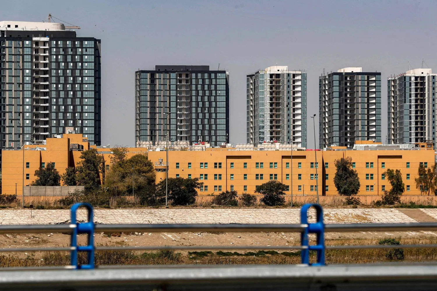 The US Embassy headquarters in Baghdad's fortified "Green Zone" is pictured on March 18, 2026. (AFP)
