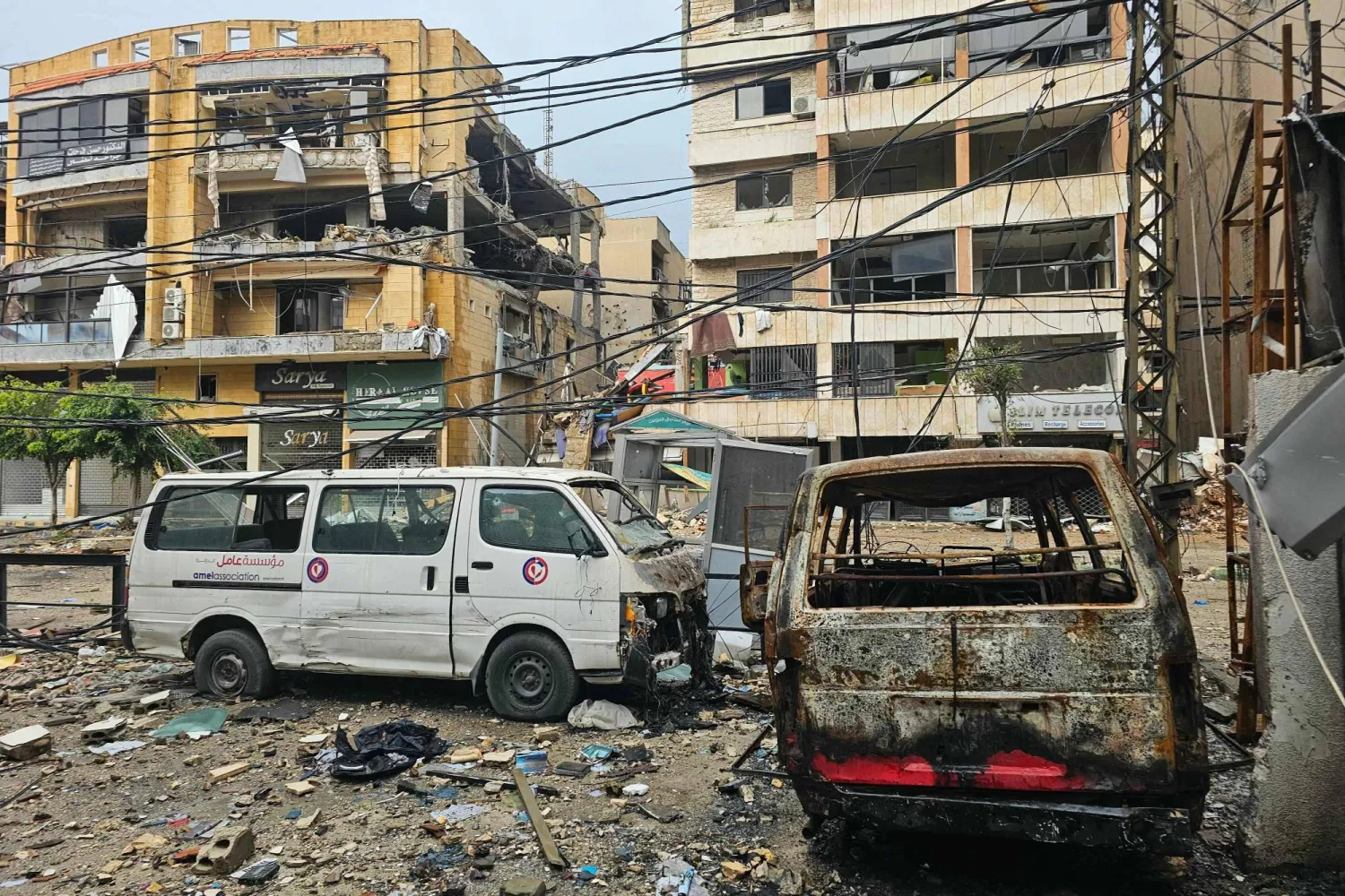 A picture shows damaged buildings and destroyed vehicles following an Israeli airstrike that targeted the Haret Hreik neighborhood in the southern suburbs of the Lebanese capital Beirut on March 21, 2026. (AFP)