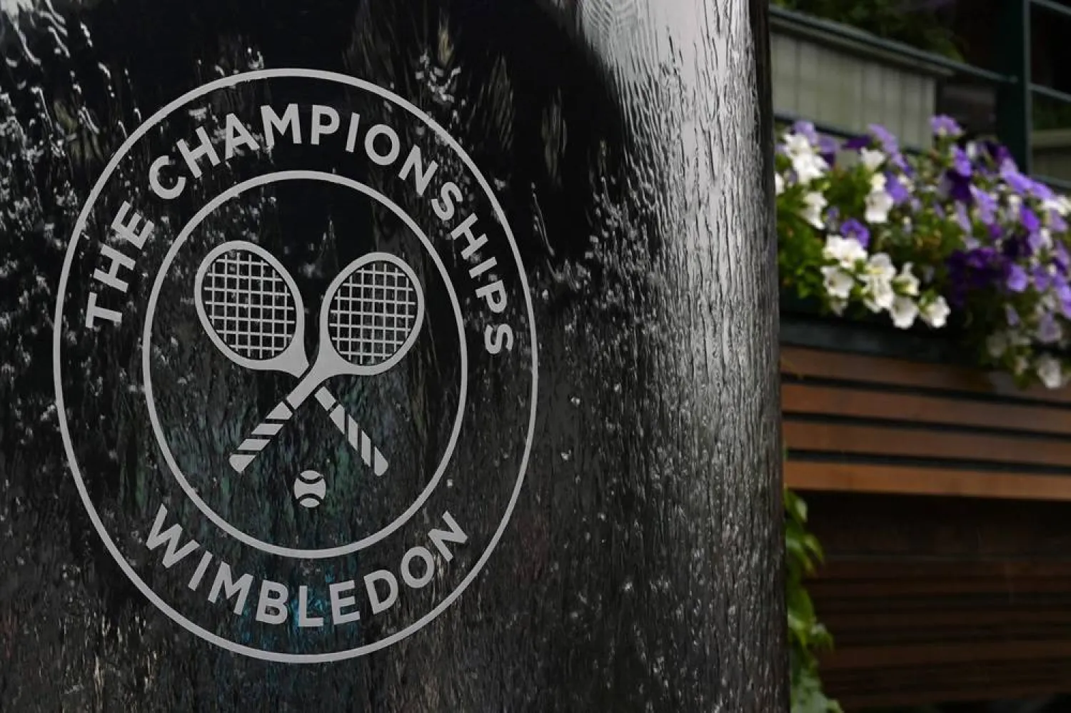 The Wimbledon logo on a water feature during the 2021 Wimbledon at the All England Tennis Club in Wimbledon, London, England, July 3, 2021. (AFP)