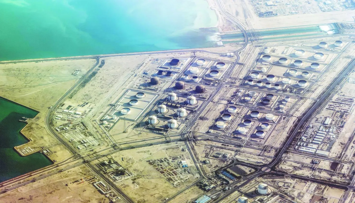 epa12835579 Liquefied natural gas (LNG) facilities in Ras Laffan Industrial City, in Ras Laffan, Qatar, 25 February 2026 (issued 20 March 2026). Qatar has said Iranian missile attacks on the Ras Laffan Industrial City have caused significant damage to the natural gas industrial complex, located approximately 80 km north-east of Doha. It is operated by Qatar Energy and employs around 115,000 people according to the company.  EPA/HANNIBAL HANSCHKE