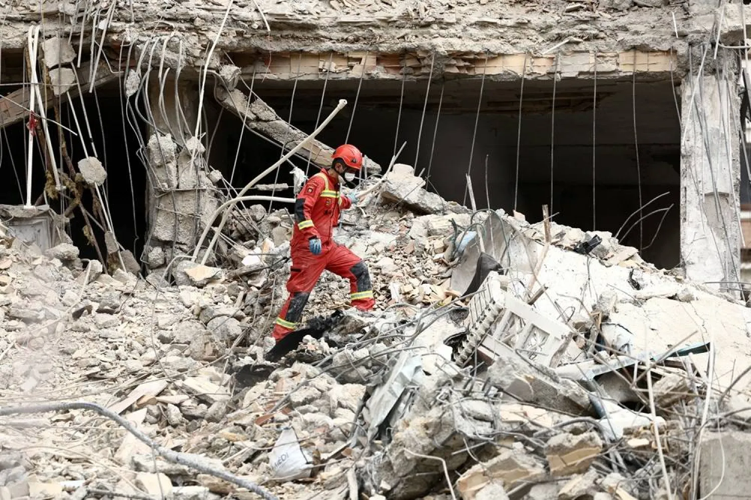 Emergency personnel work at the site of a strike on a residential building, amid the US-Israeli conflict with Iran, in Tehran, Iran, March 23, 2026. Majid Asgaripour/WANA (West Asia News Agency) via Reuters