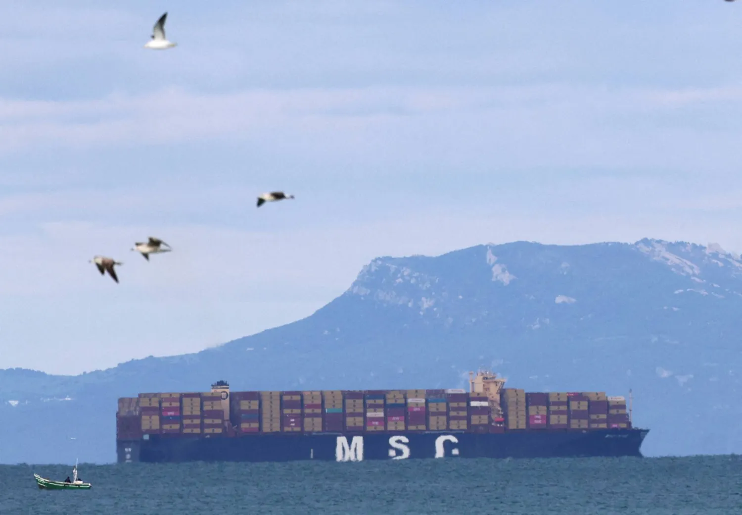 FILE PHOTO: An MSC container ship crosses the Strait of Gibraltar from the Atlantic Ocean to the Mediterranean Sea, near the northern tip of the port of Tangier, Morocco, January 8, 2026. REUTERS/Amr Abdallah Dalsh