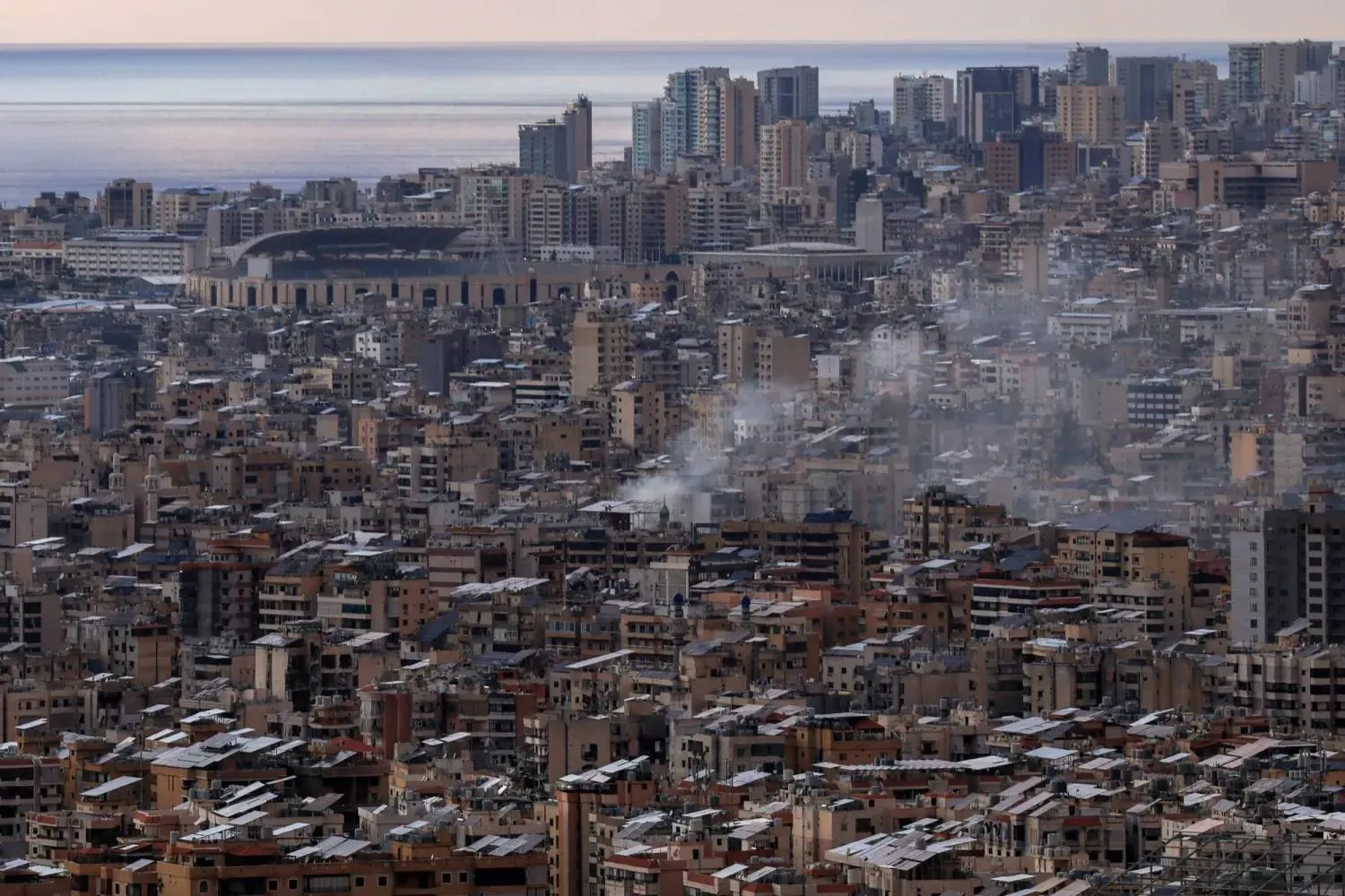 Smoke rises after an Iranian missile is intercepted over the Sahel Alma area in Mount Lebanon. (Reuters)
