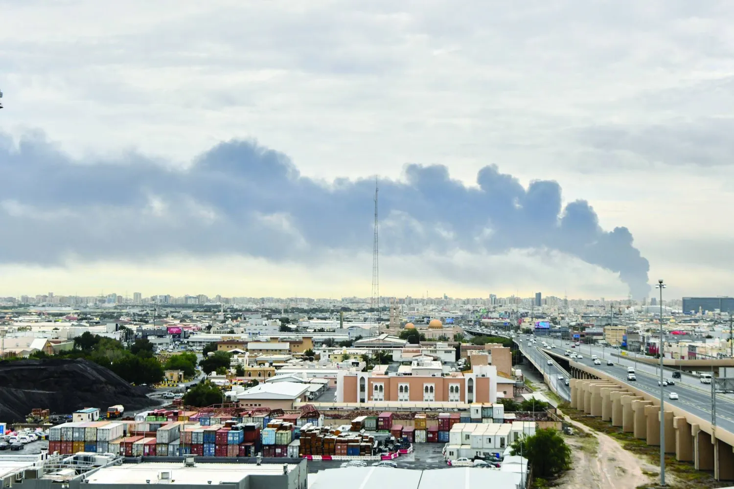 Smoke rises from the area of Kuwait International Airport after a drone strike targeted a fuel depot (AP)