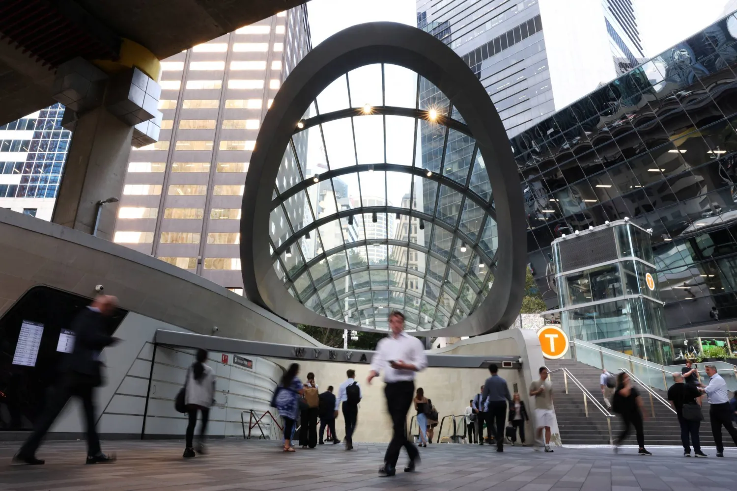 Commuters walk past Wynyard Station in Sydney, Australia, March 25, 2026. REUTERS/Hollie Adams