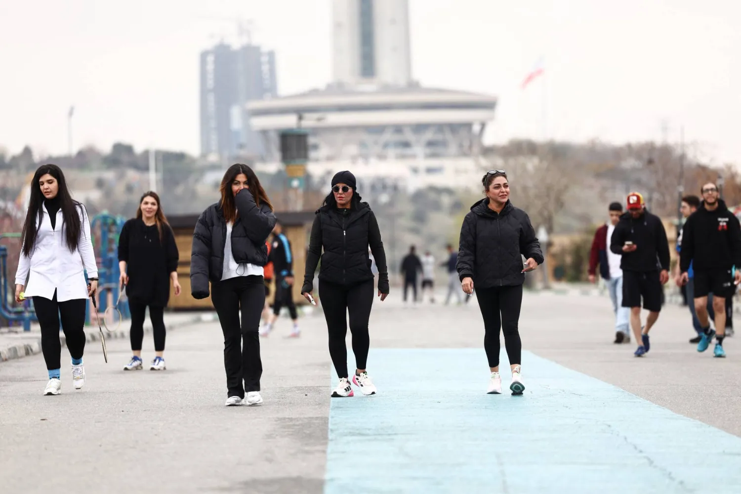 Iranian women walk at Pardisan Park, amid the US-Israeli conflict with Iran, in Tehran, Iran, March 25, 2026. Majid Asgaripour/WANA (West Asia News Agency) via REUTERS  