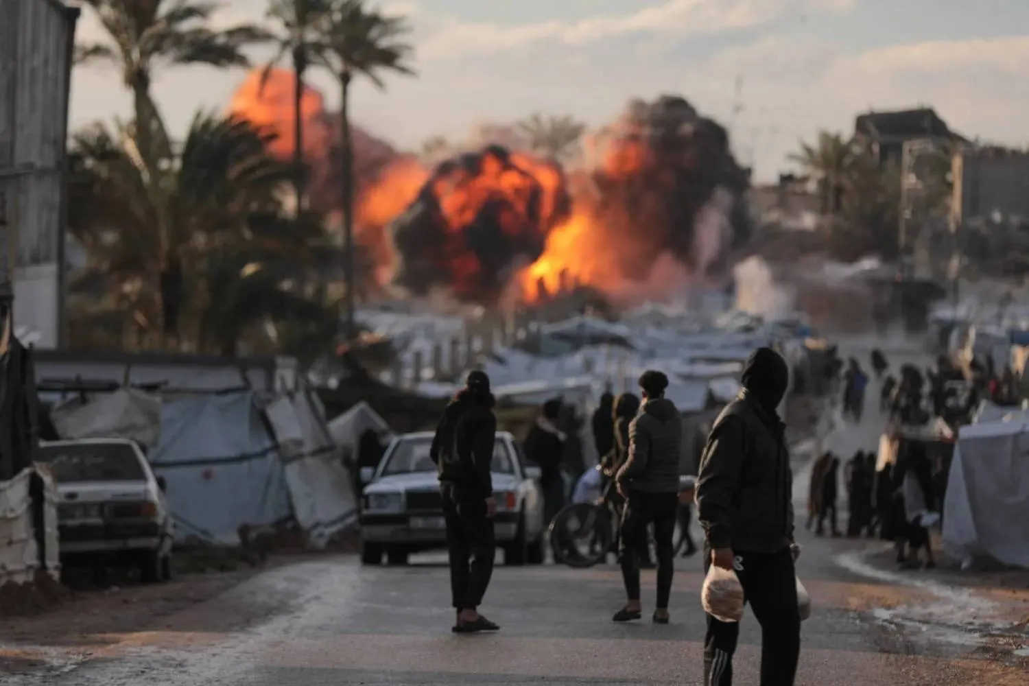 Smoke rises from a site hit by an Israeli strike near a camp for displaced people in Deir al-Balah in central Gaza Strip last Wednesday (AP)