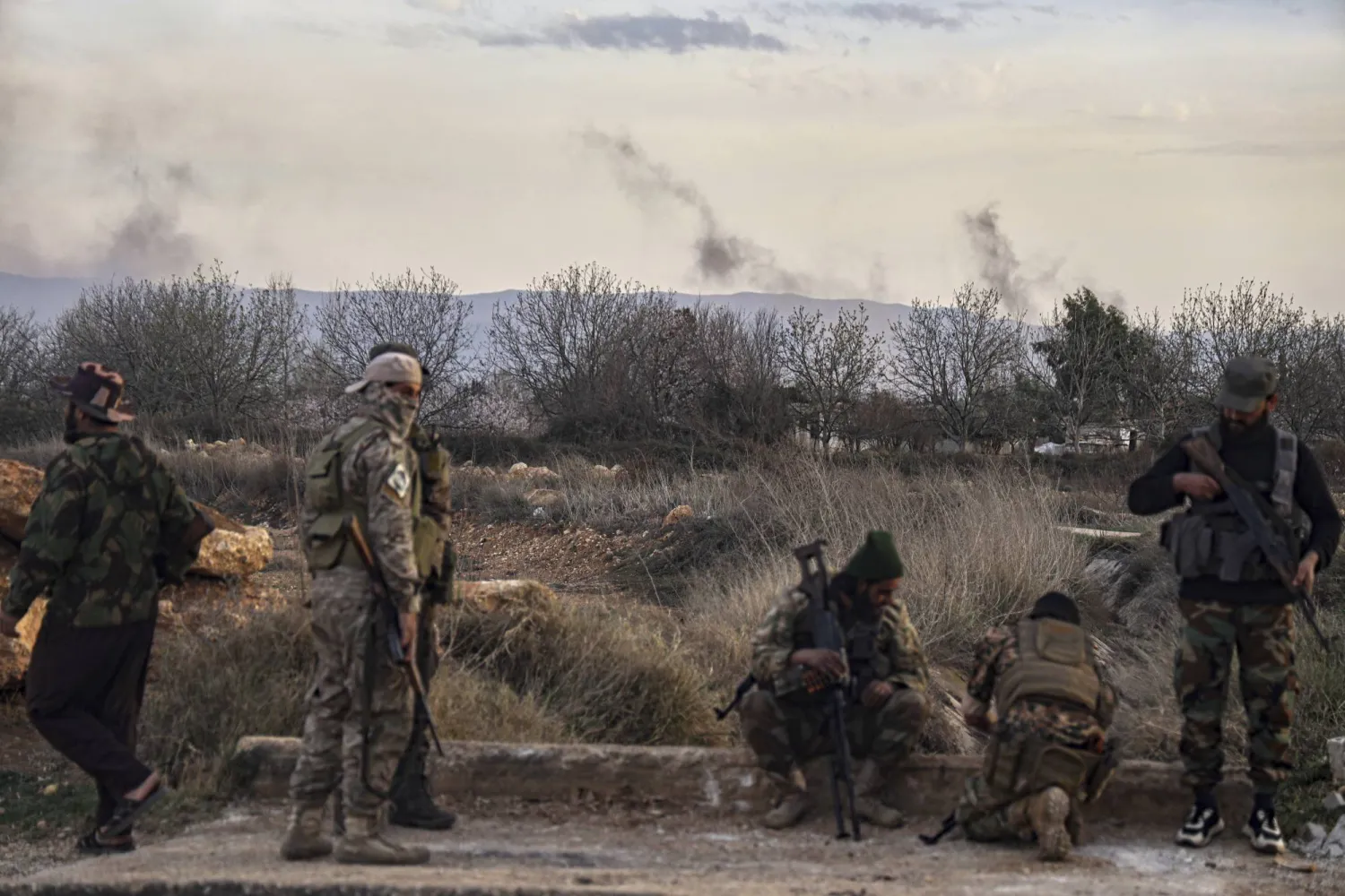 Syrian troops take position in the village of Hawsh al-Sayyid Ali, located 2 km (1.24 miles) from the Lebanon border, Syria, Monday, March 17, 2025. (AP)