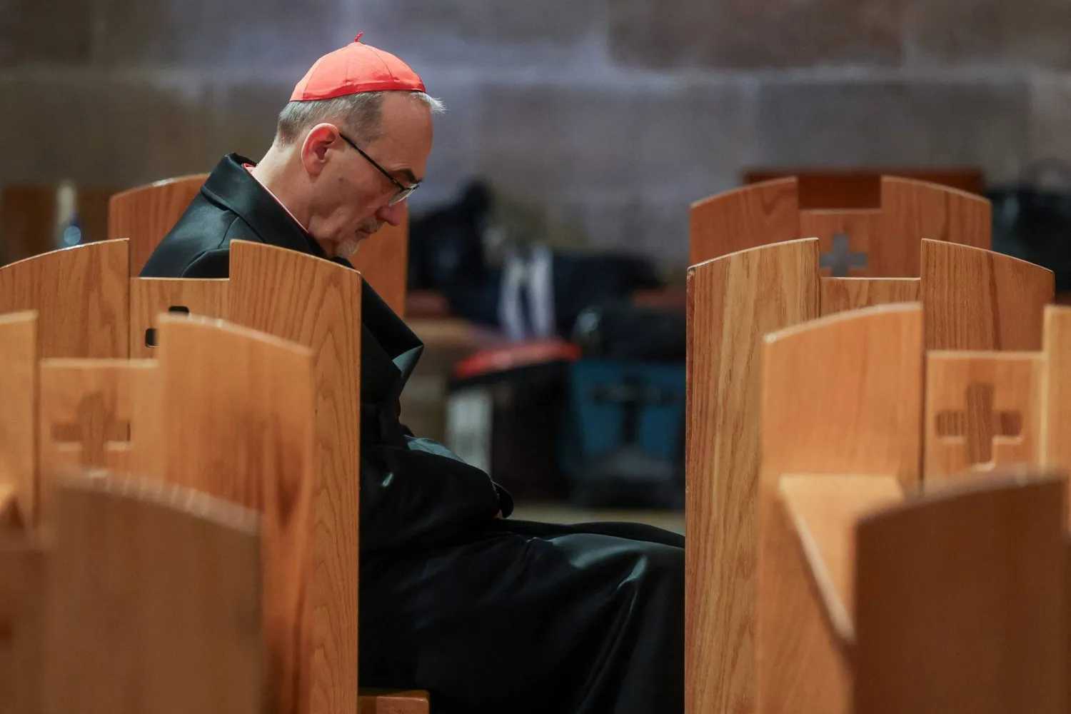  Latin Patriarch of Jerusalem, Cardinal Pierbattista Pizzaballa, sits inside the Church of All Nations on the day of a prayer service to mark Palm Sunday in Jerusalem on March 29, 2026, following the cancellation of the traditional Palm Sunday procession from the Mount of Olives amid restrictions on gathering in large groups and the US-Israeli war on Iran. (AFP)