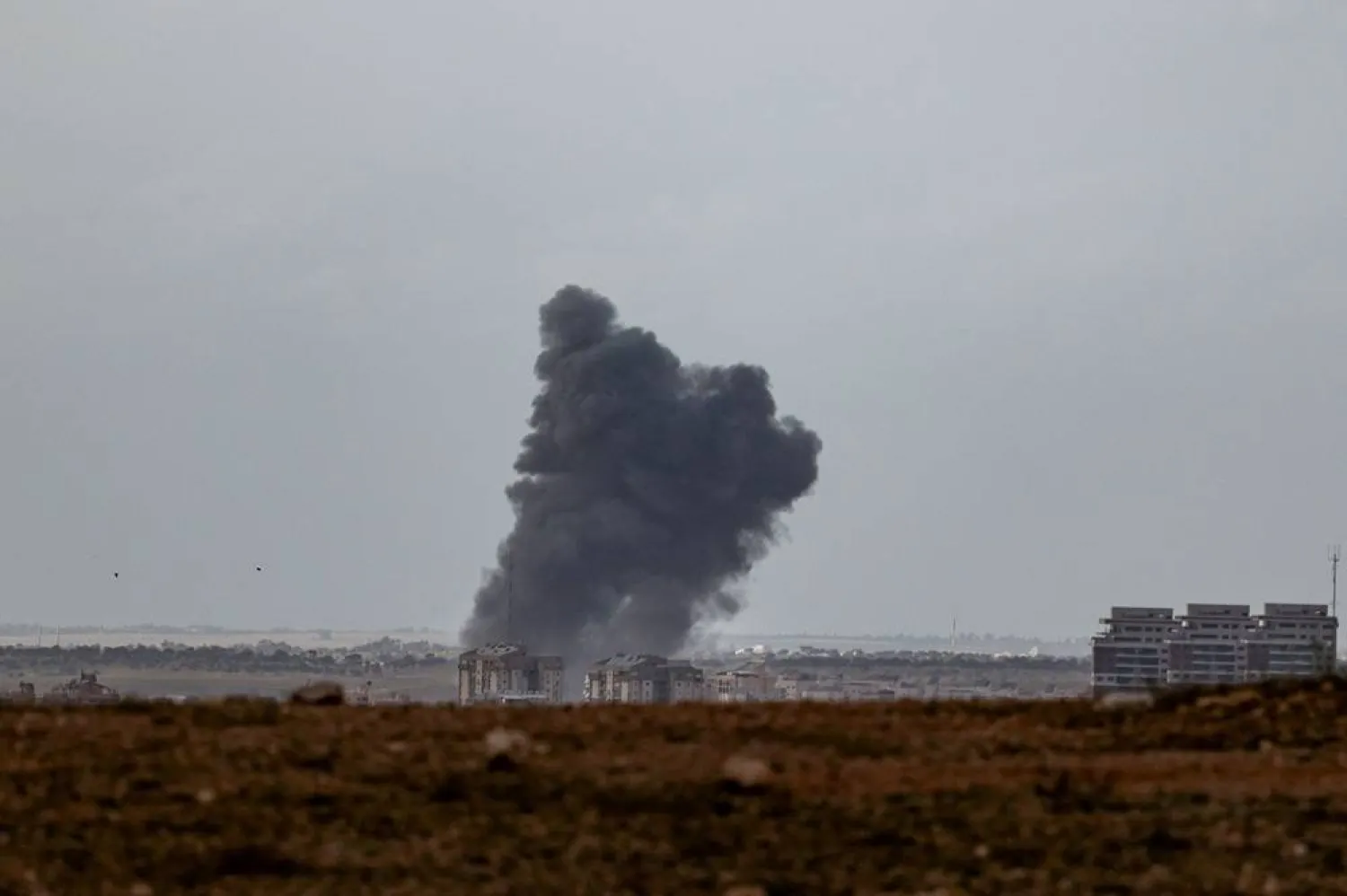  Smoke rises following an Iranian missile strike, as the US-Israeli conflict with Iran continues, in southern Israel, March 29, 2026. (Reuters)