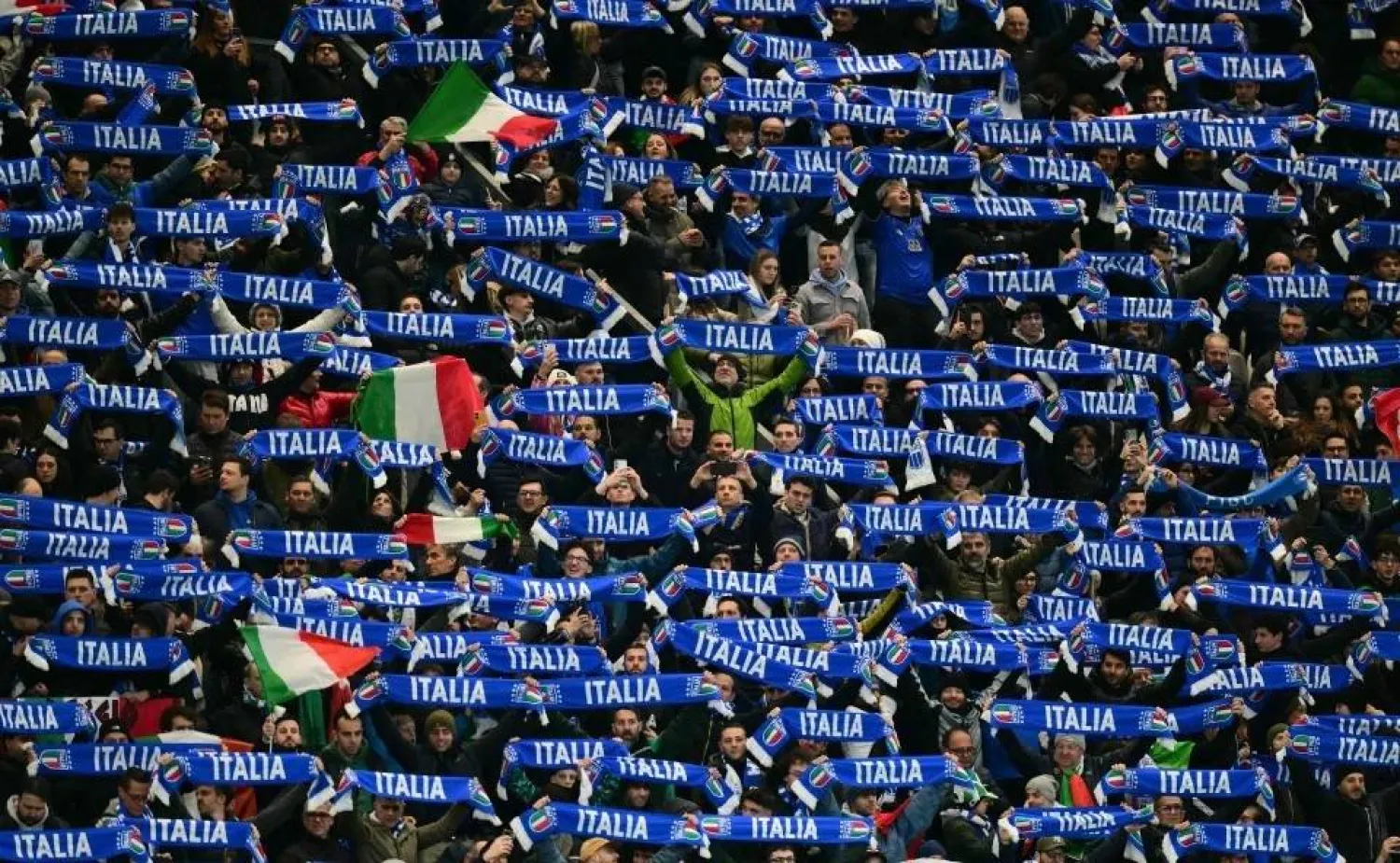Italy's supporters cheer during the play-off FIFA World Cup 2026 European qualification semifinal against North Ireland in Bergamo on March 26, 2026. (AFP) 