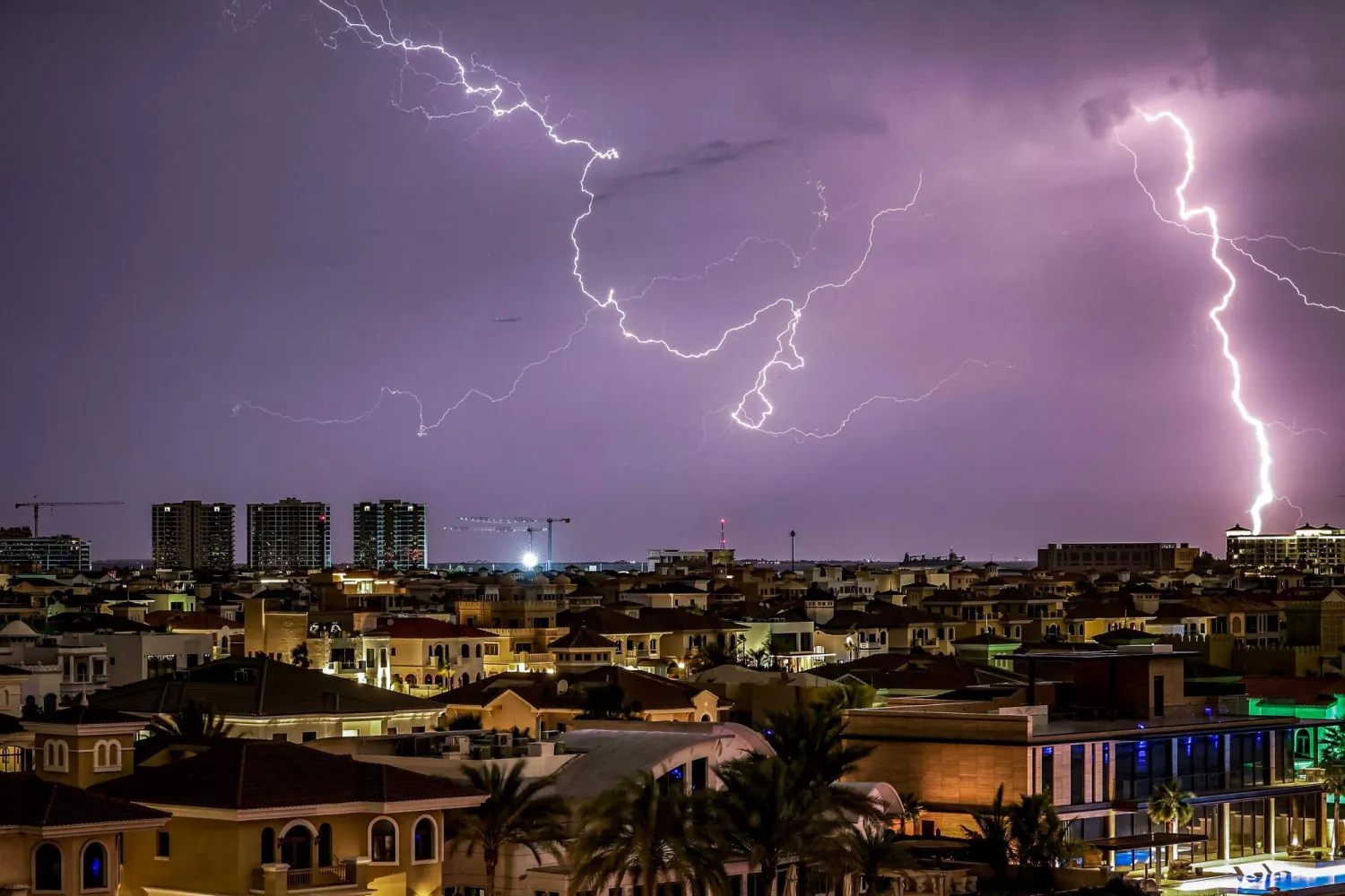 Lightning illuminates the sky over Dubai during a thunderstorm on March 26, 2026. (Photo by FADEL SENNA / AFP)