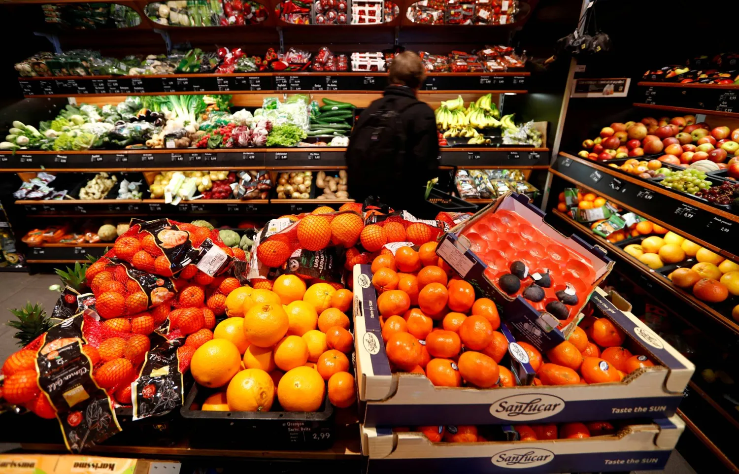 Shelves filled with fruit inside a supermarket in Berlin (Reuters)